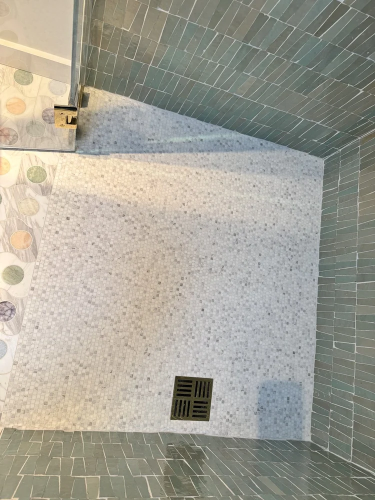 Green tile shower installation — project view.