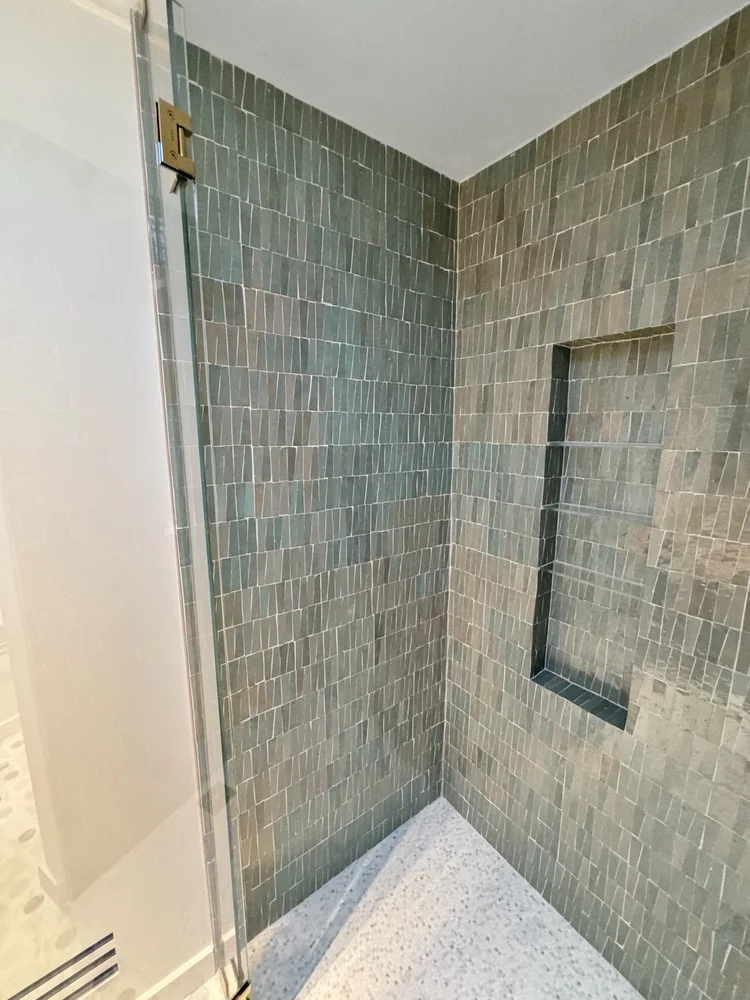 Green tile shower installation — project view.