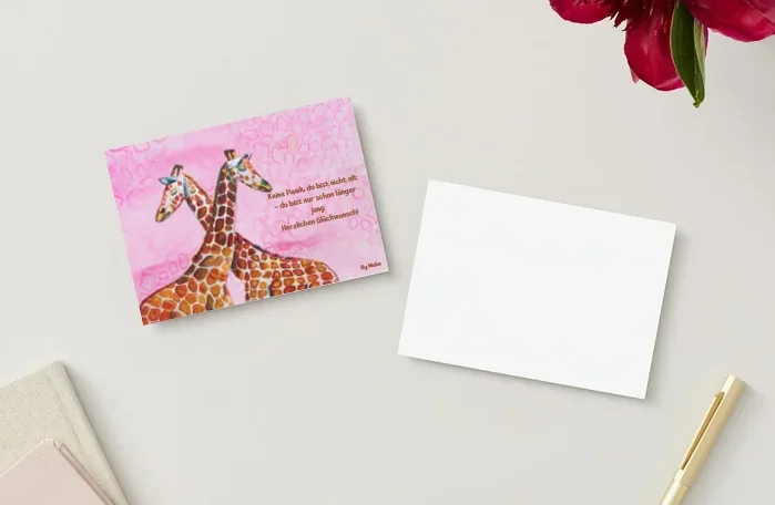 Giraffe Post Card — postcard of two giraffes on a pink background