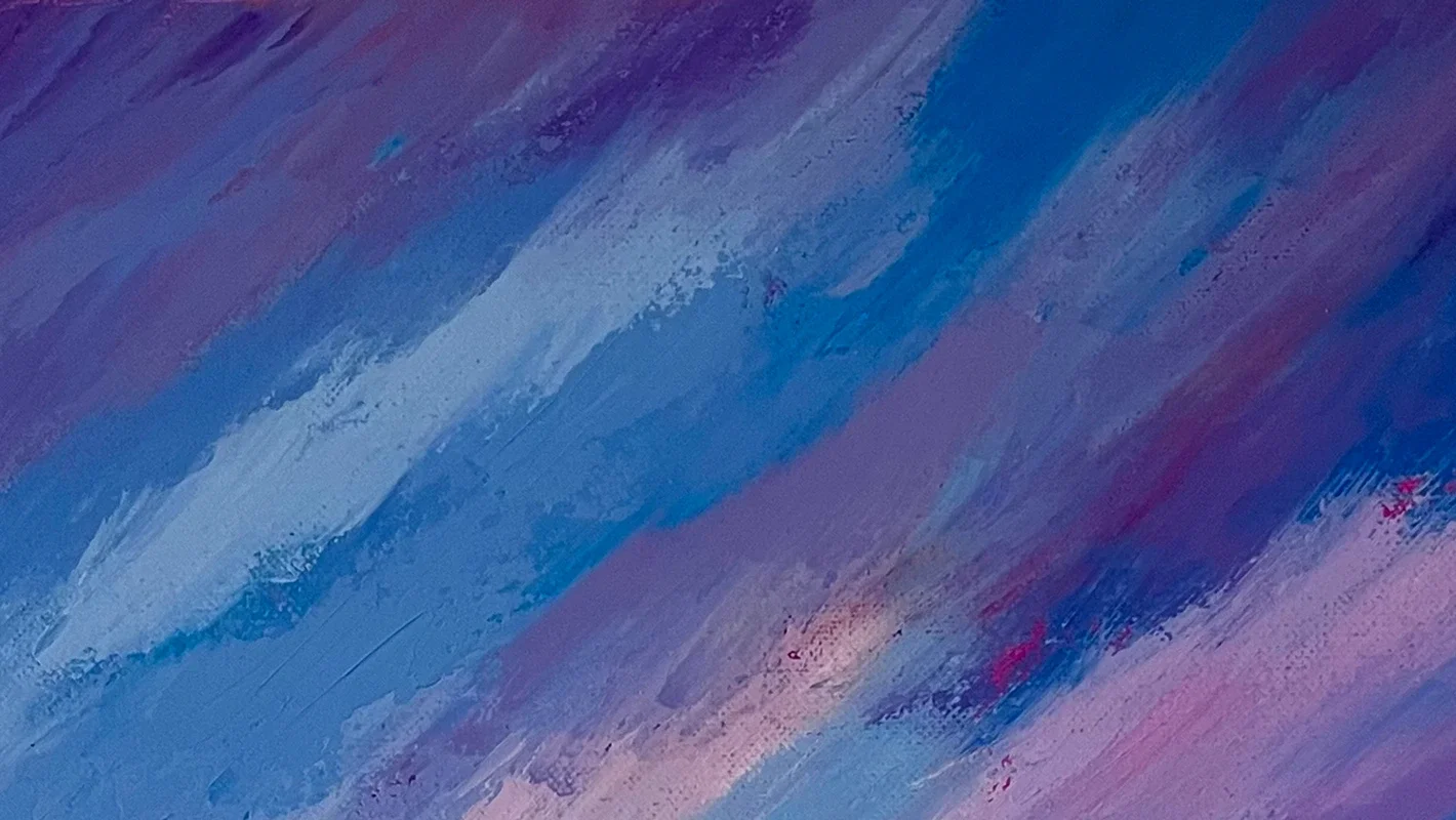 Detail of a painted sky in blue, violet and pink