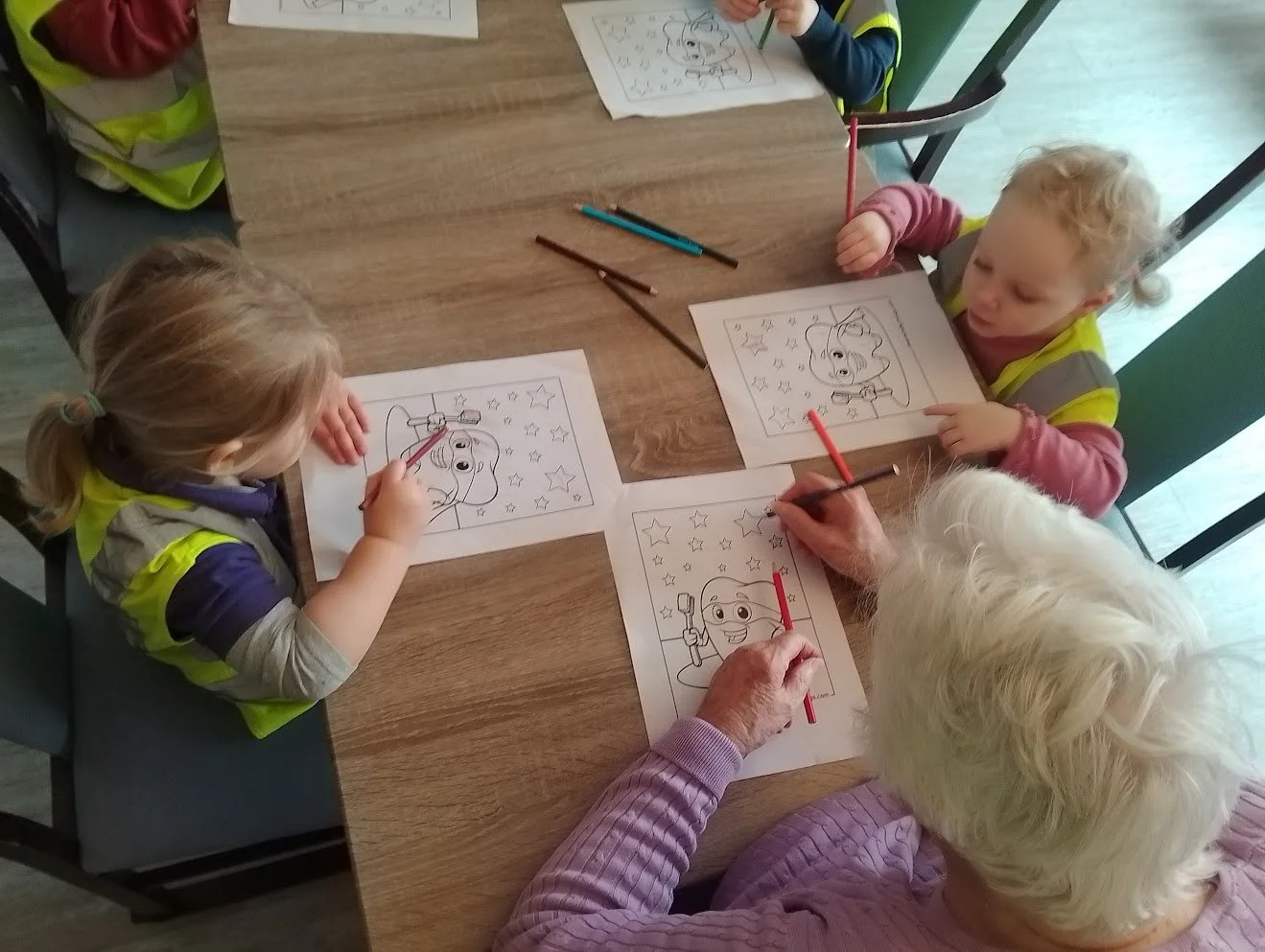 Children from Rydal Day Nursery taking part in an intergenerational community colouring activity