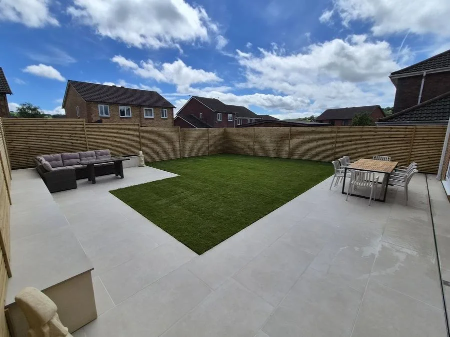 Landscaped garden with porcelain patio and turf