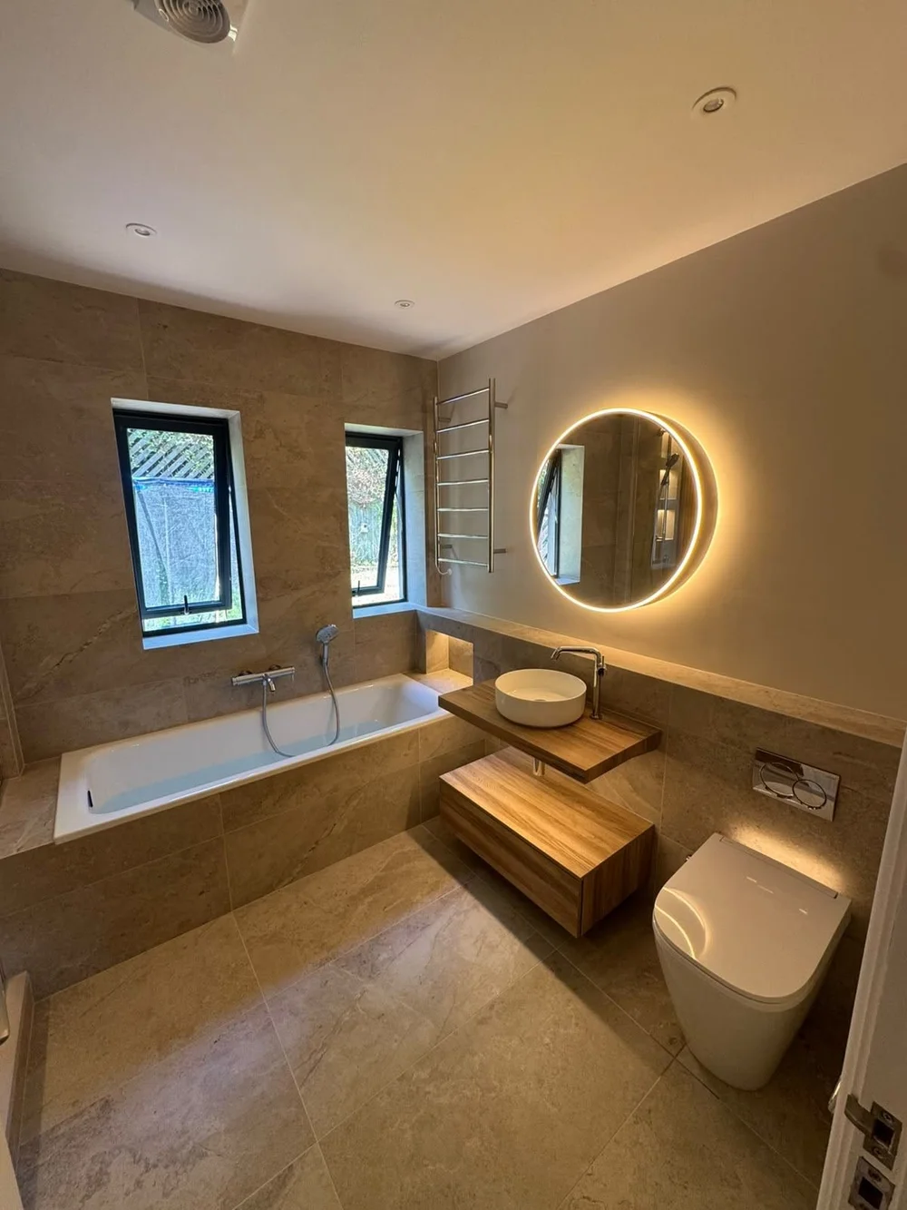 Vanity and lit mirror