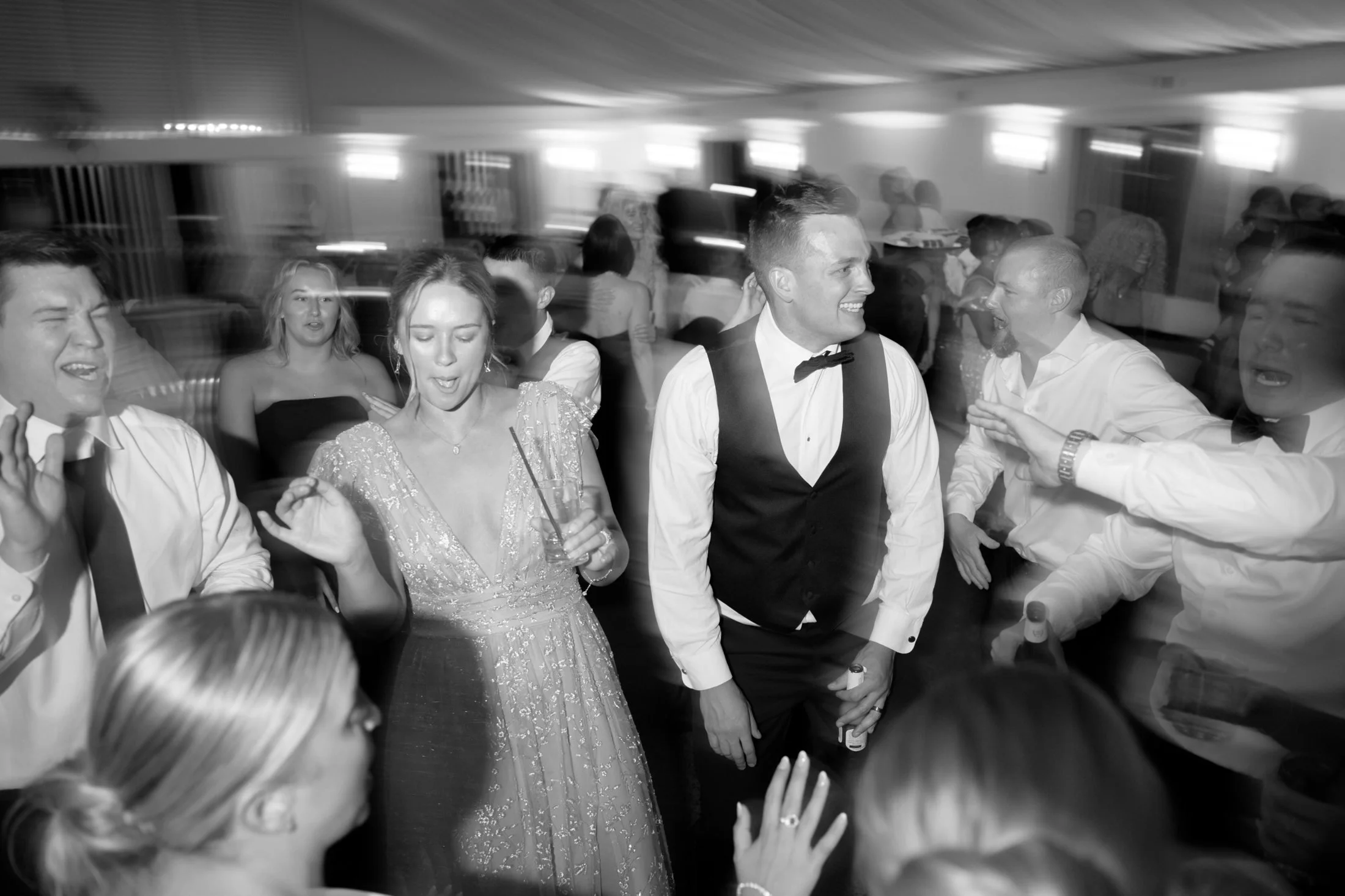 Bride and groom dancing with guests at an Evented Sound wedding