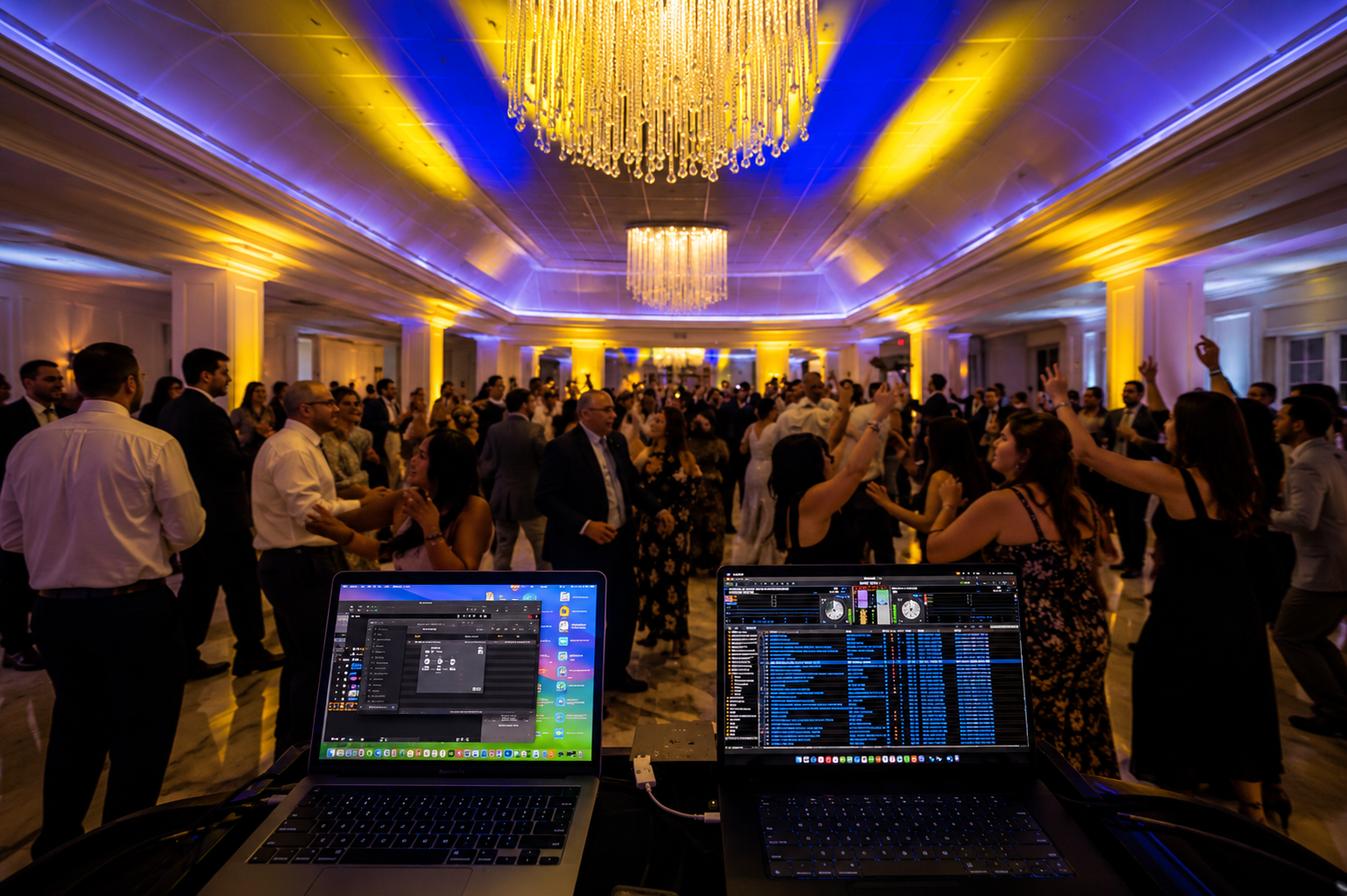 Evented Sound DJ booth and a packed wedding reception dance floor