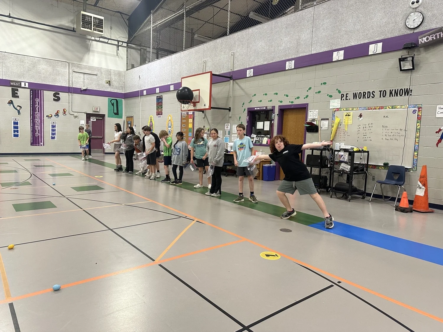 Texas SuperStars participants enjoying an active program in a school gym