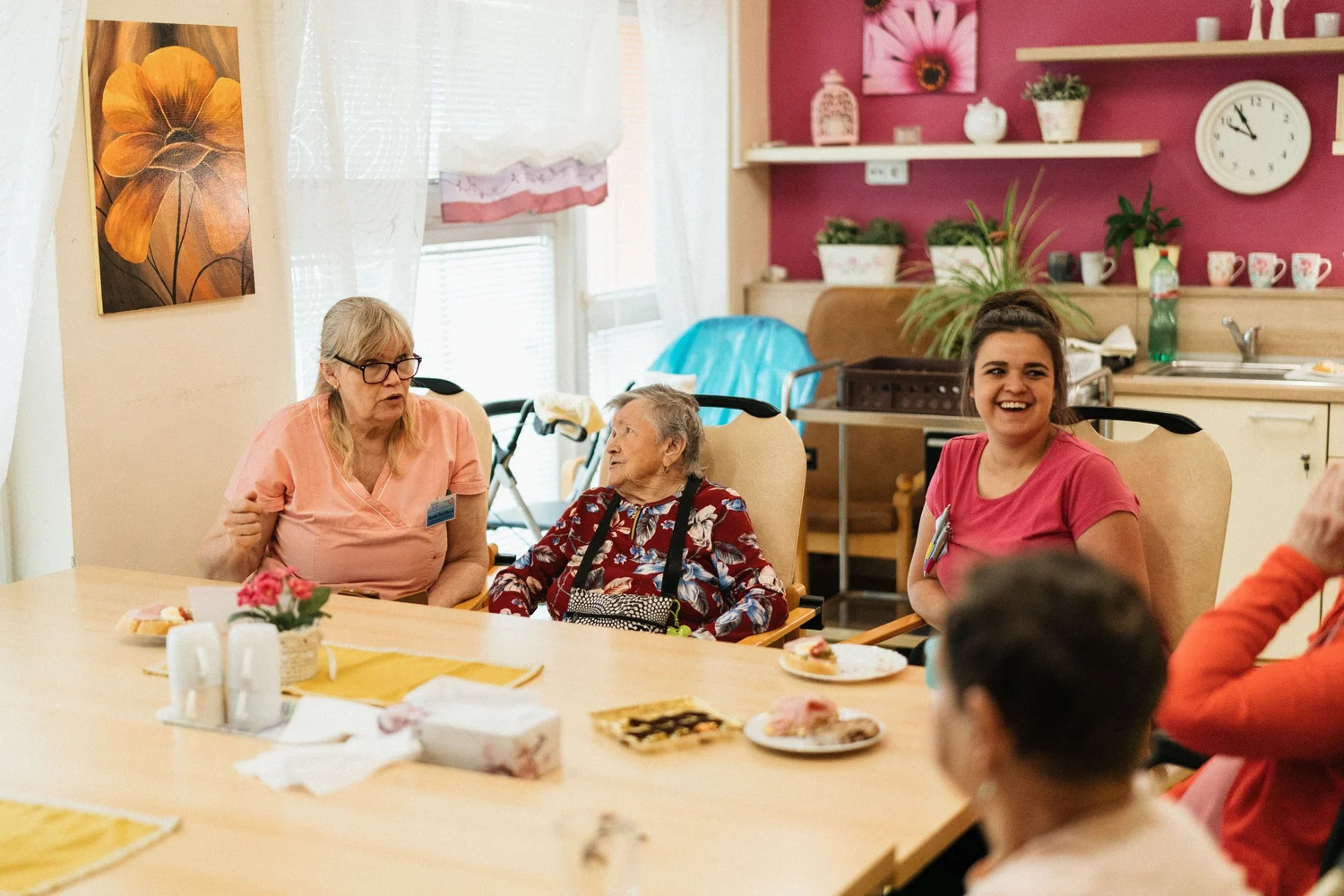 People sharing a meaningful activity in a care setting