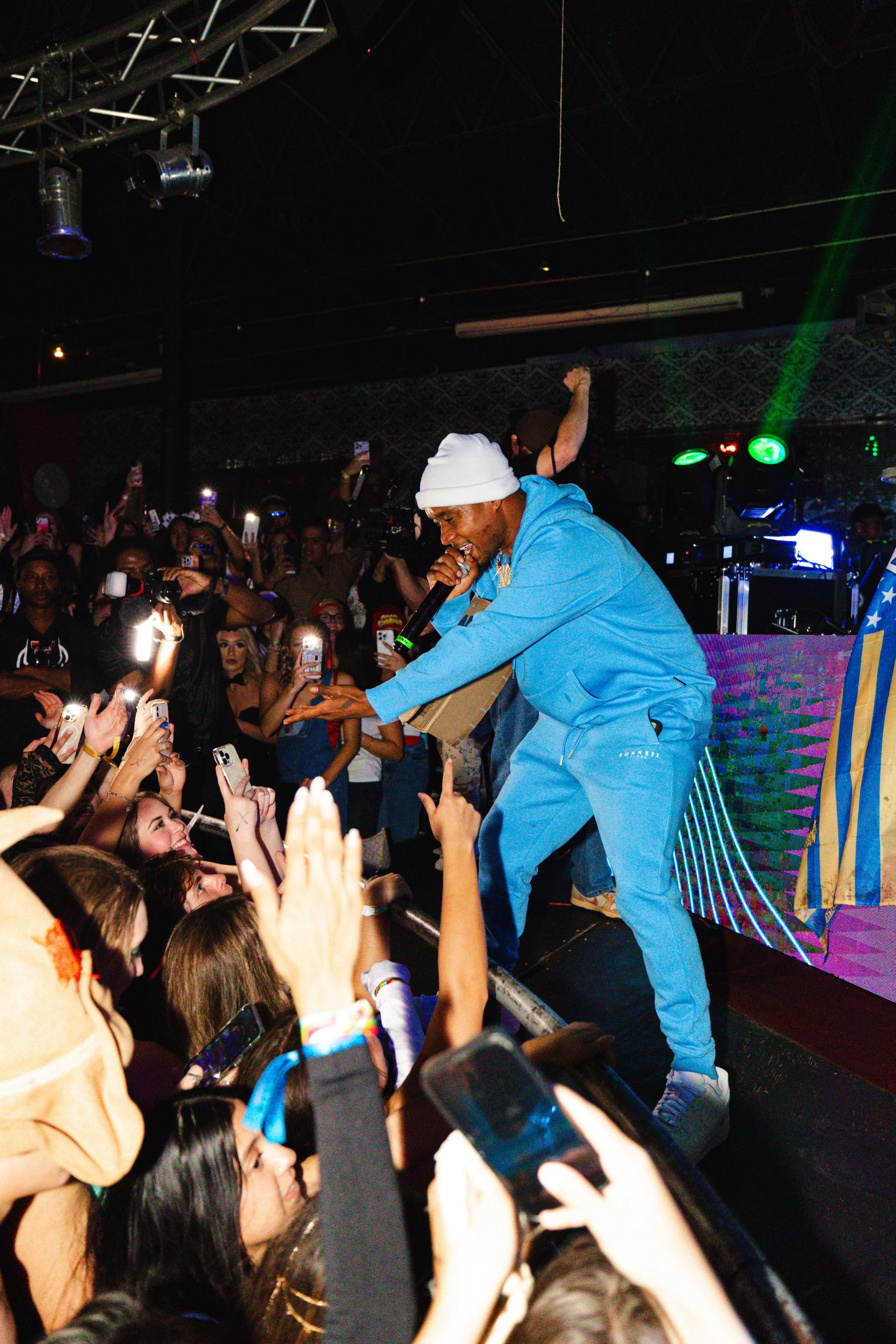 DJ set with crowd at a BMF Presents event