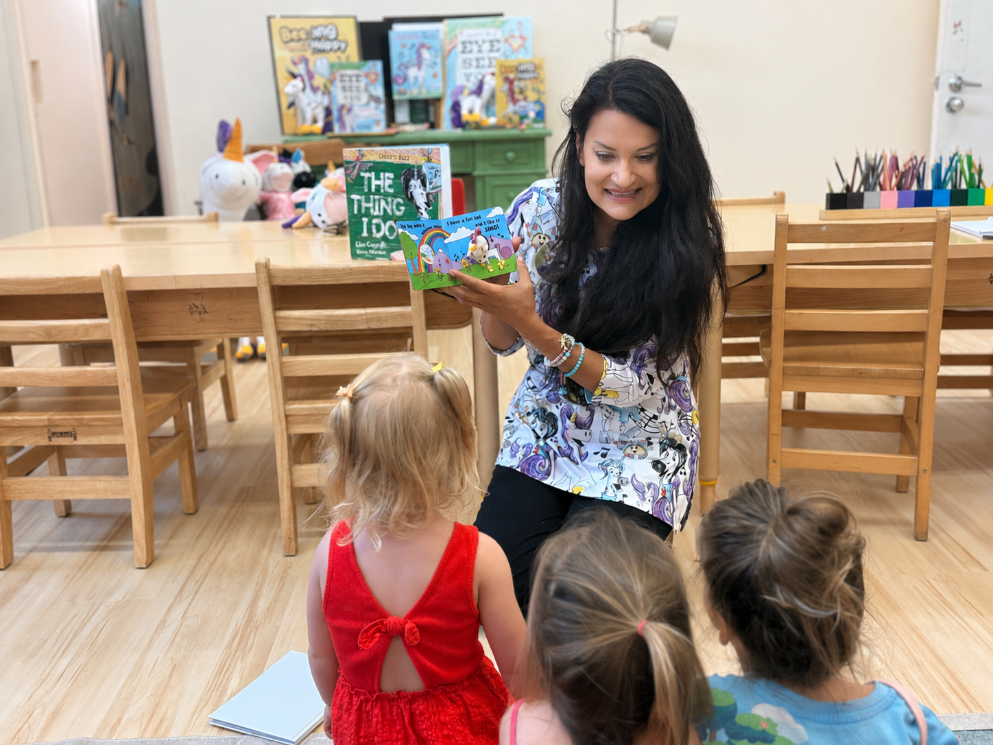 Storytime with a Unicorn Jazz book in a classroom.