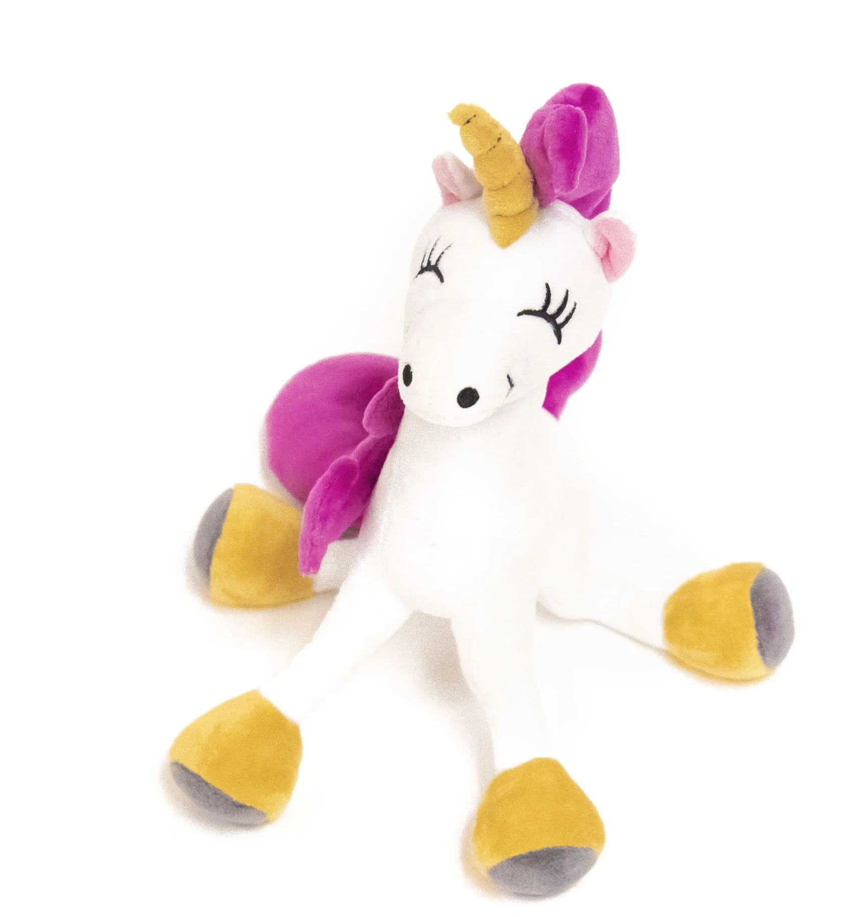 White unicorn plush with a pink mane, yellow horn and yellow hooves on a white background.