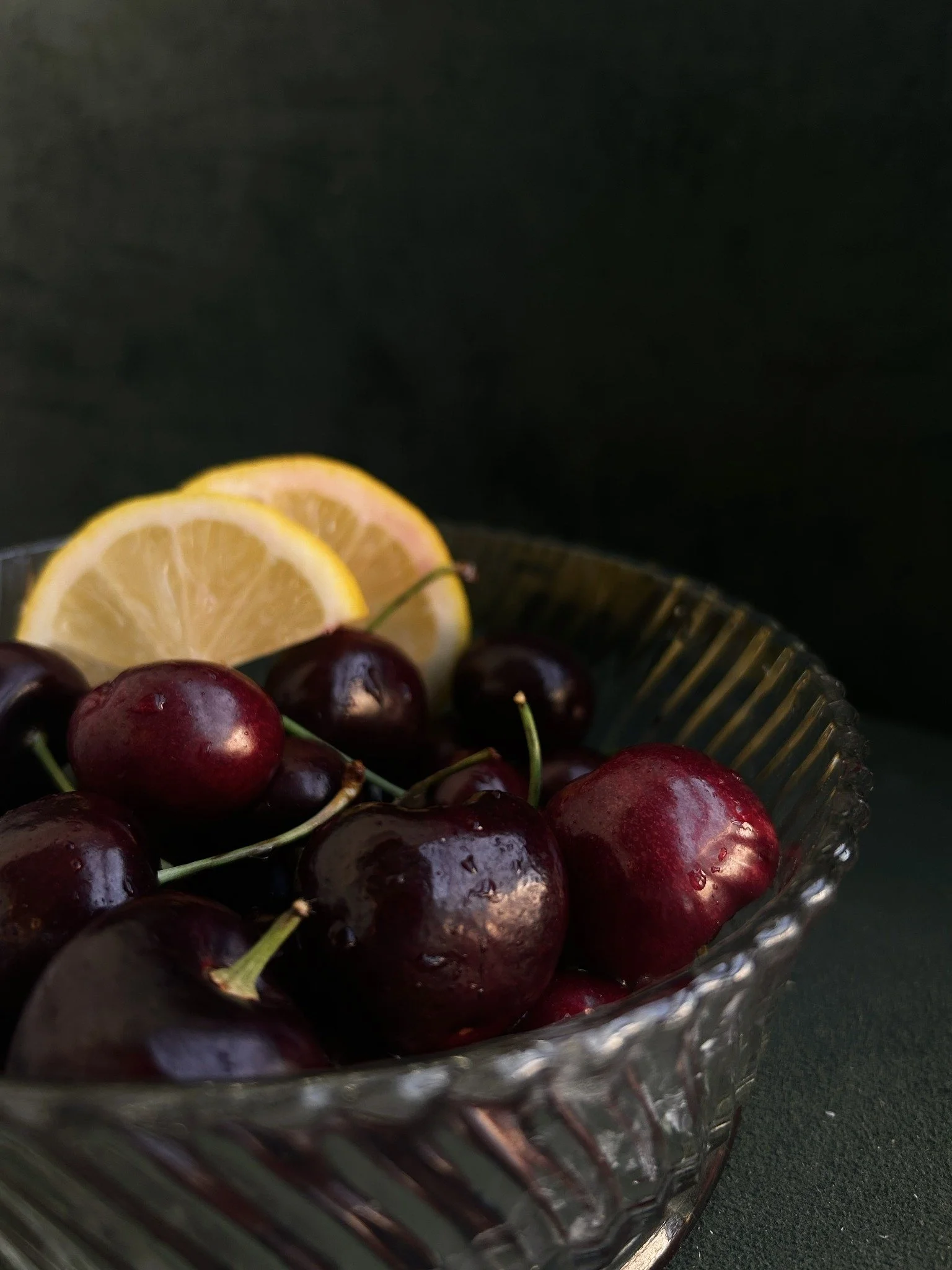 Cherries and lemon still life