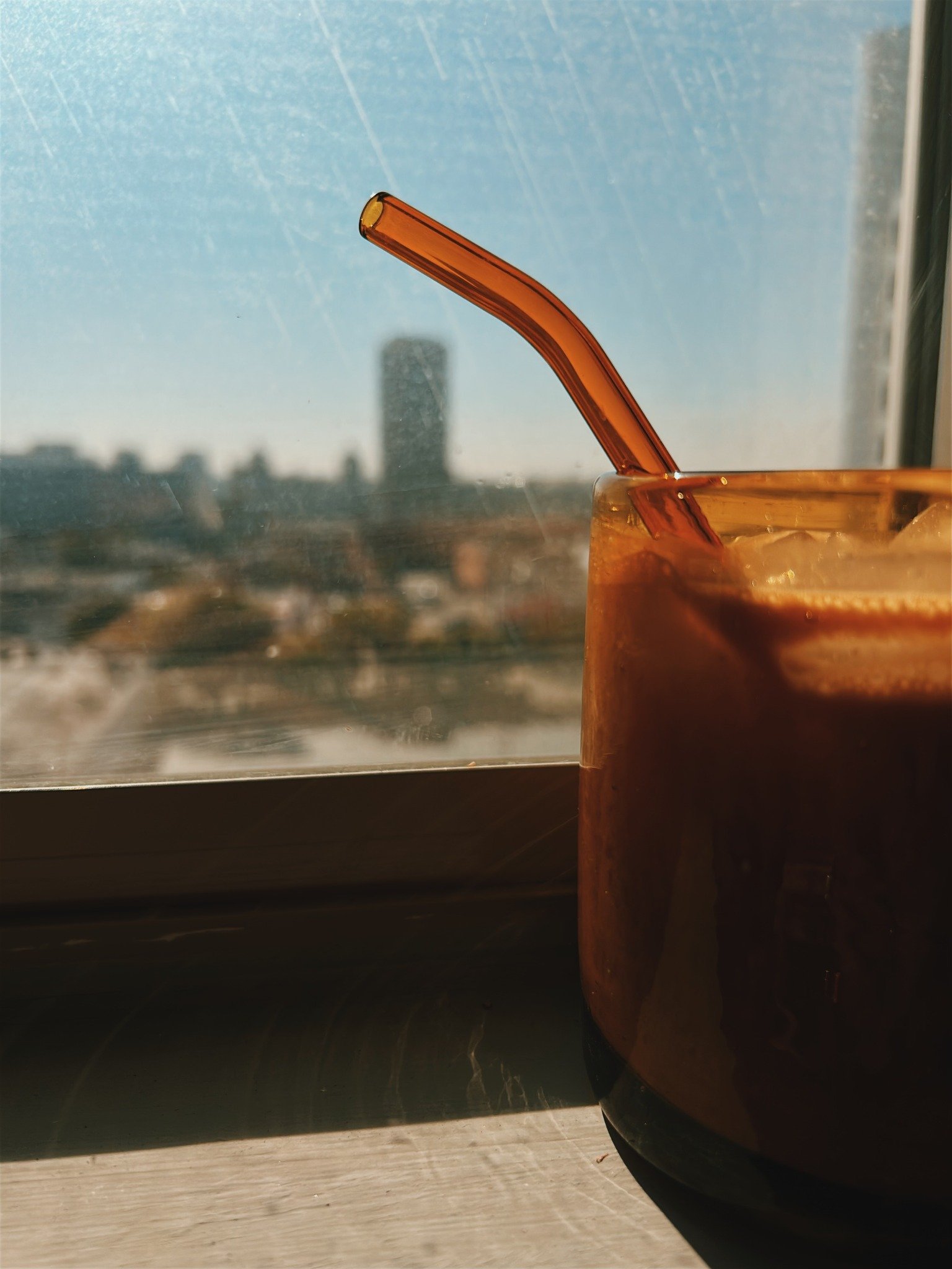 Morning drink in warm window light