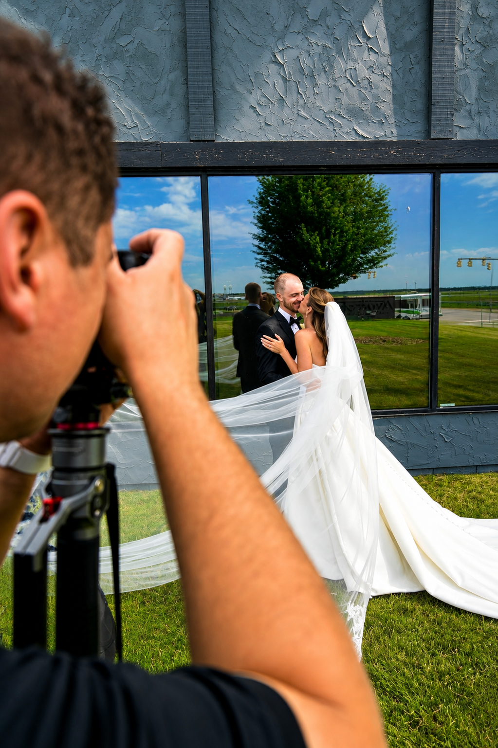 Vows & Ember filming a bride and groom during wedding portraits