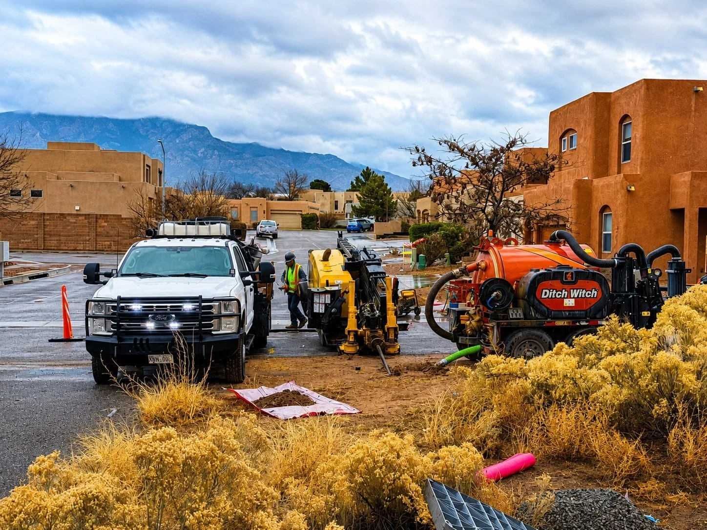 JMM Underground service truck, vacuum excavator and directional drill.