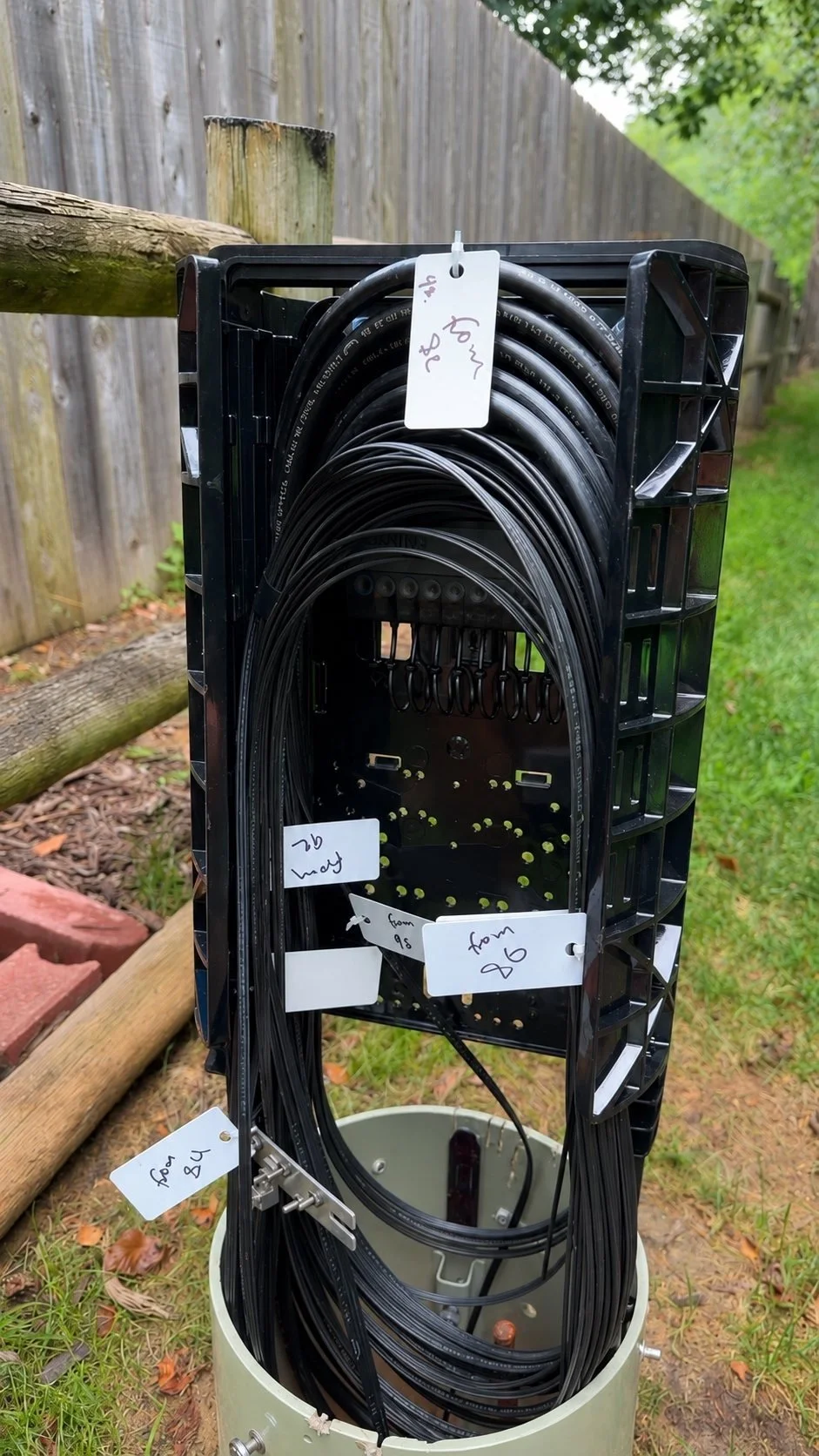 Open fiber pedestal with coiled drops.