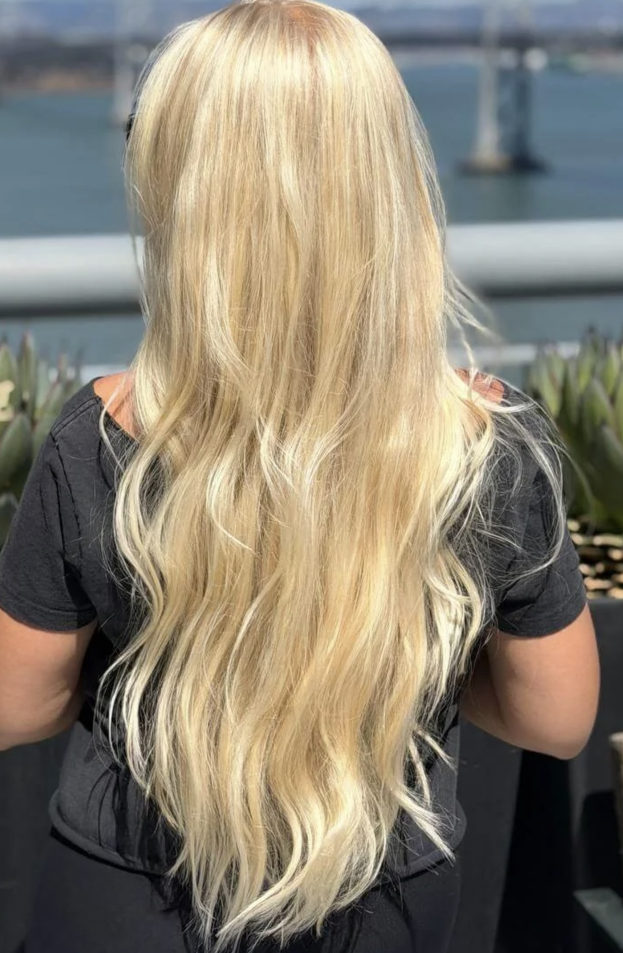 Long healthy blonde hair, color work by Olena