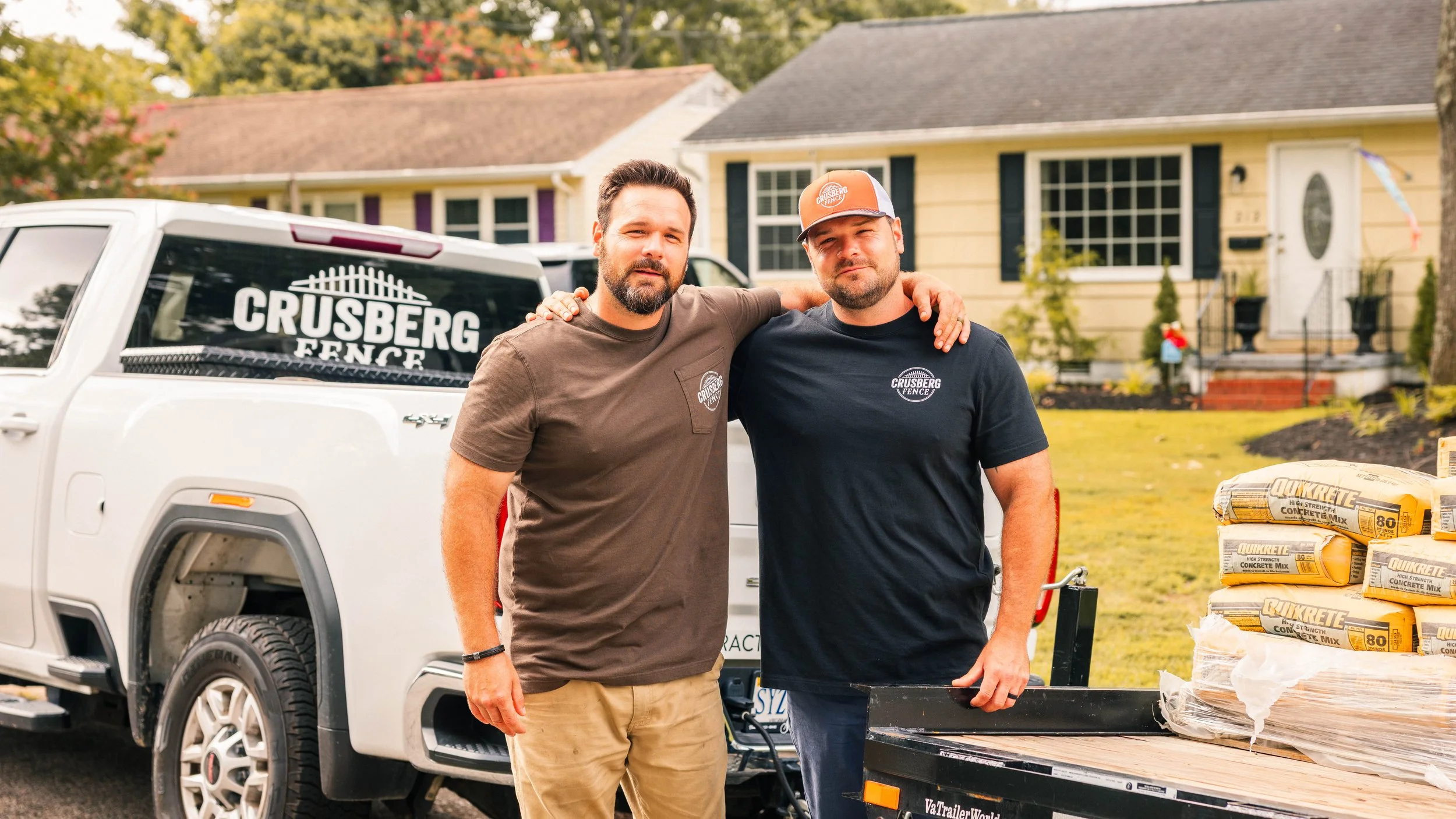 Crusberg Fence crew measuring and building a fence in Yorktown, VA