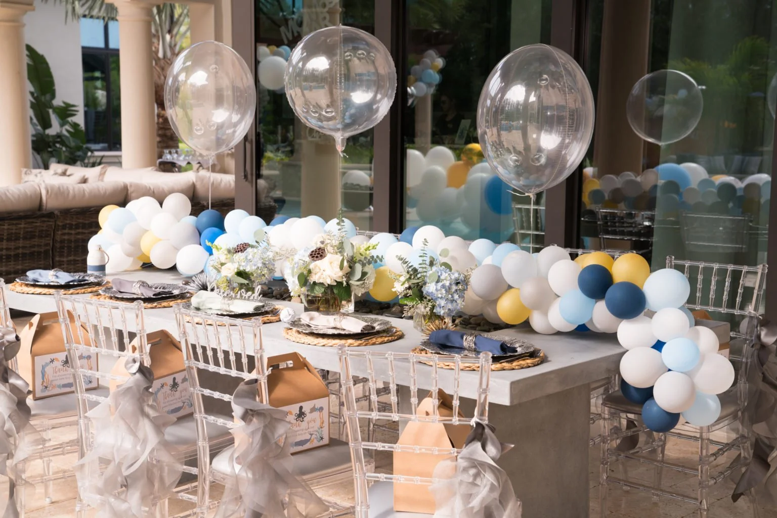 Clear event chairs at a Tampa baby shower