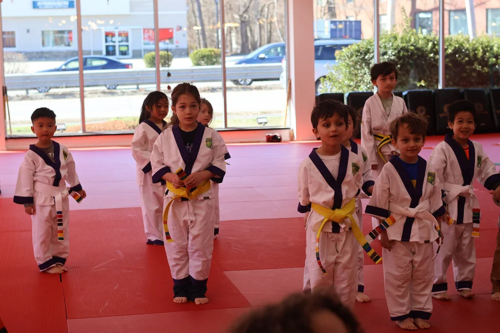 Little Ninjas students gathered on the Academy mat during class