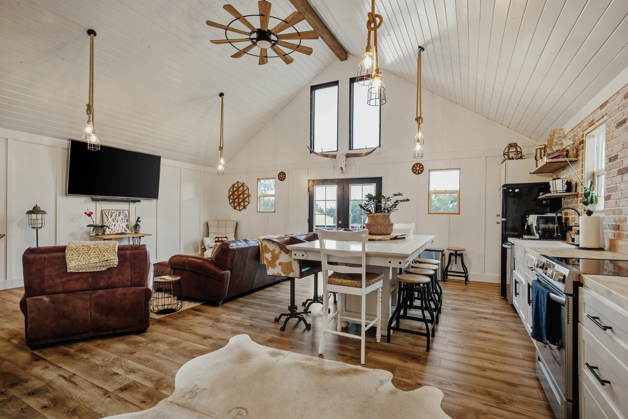 Bright Farm Loft living room and kitchen with vaulted ceilings