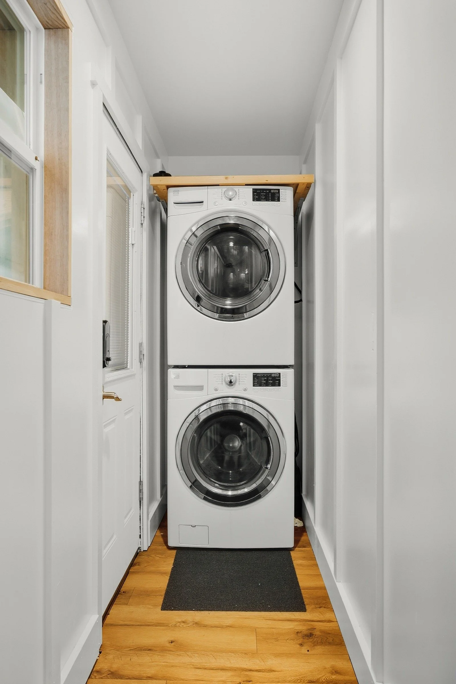 Stacked washer and dryer in the loft laundry nook