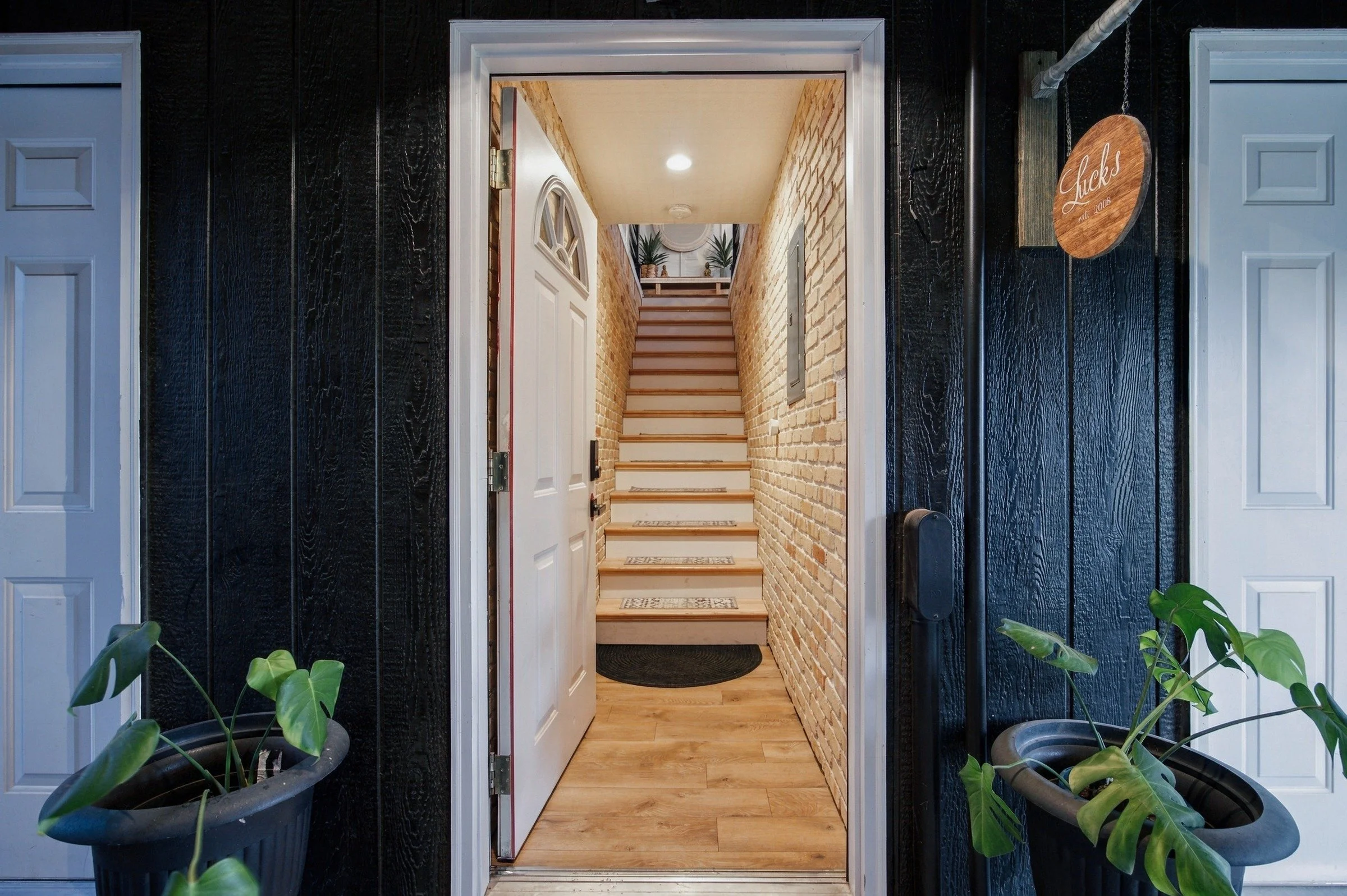 Loft entrance with stairs leading upstairs
