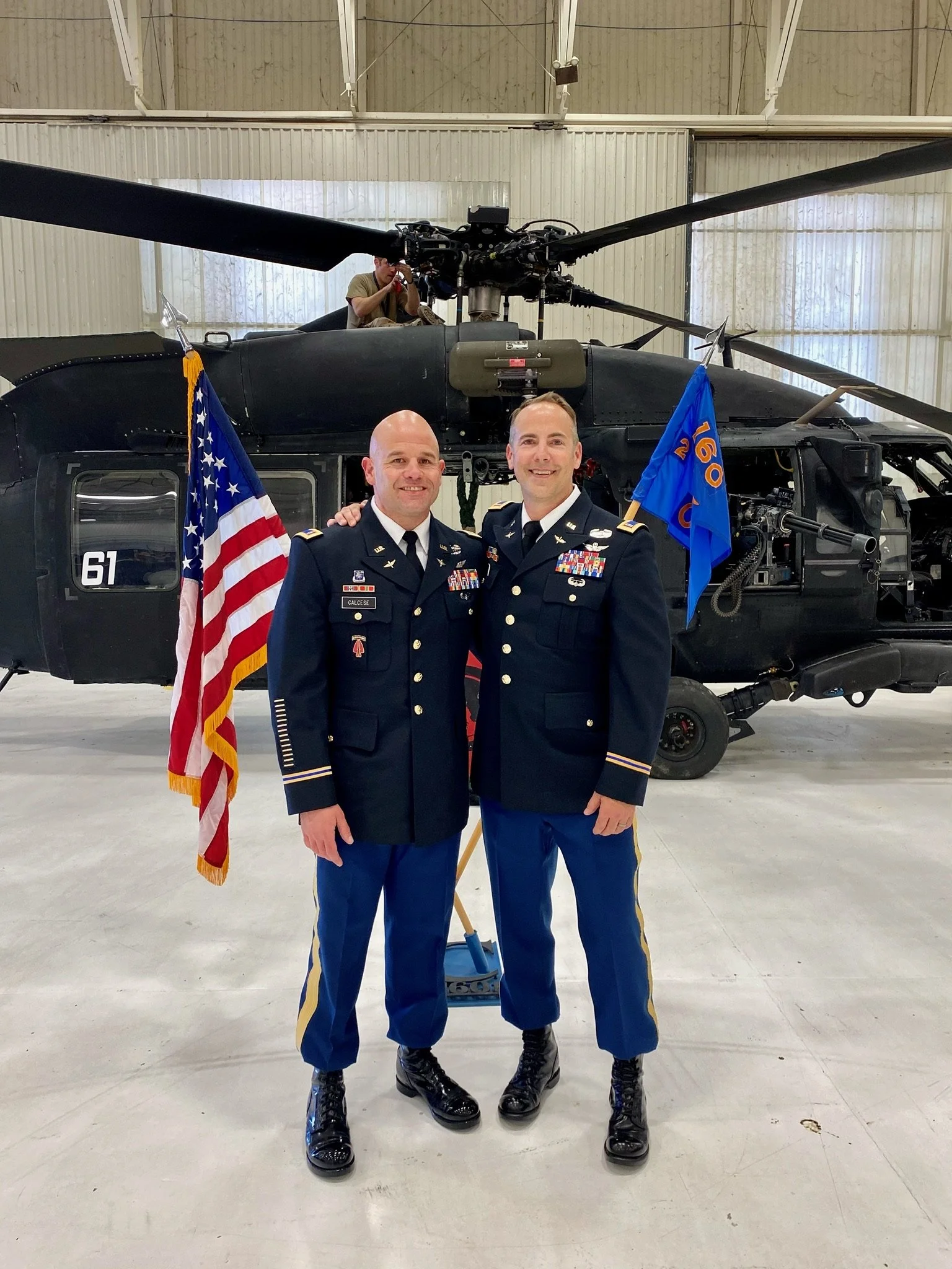 Phil Calcese with the 160th in hangar