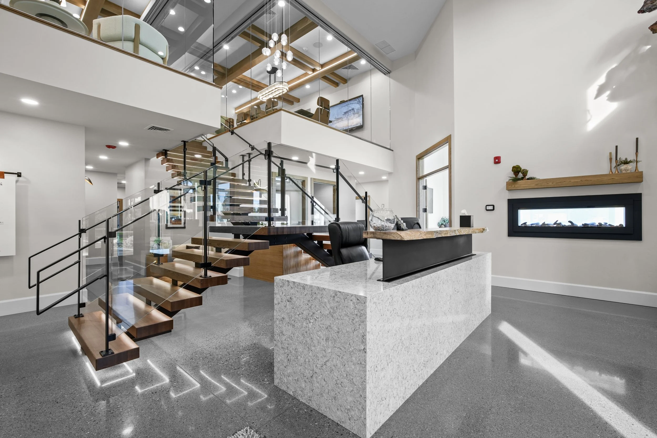 Inside the JAB office, with its reception area and open staircase