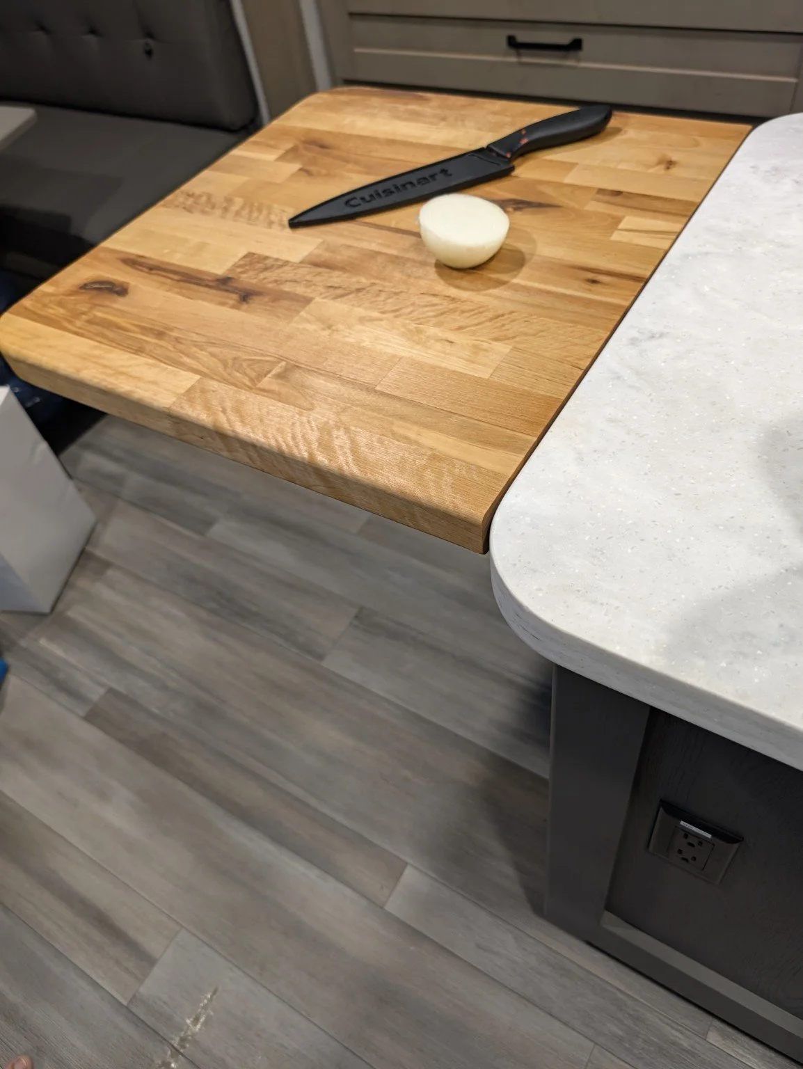 Fold-down counter extension opened flush with the existing counter
