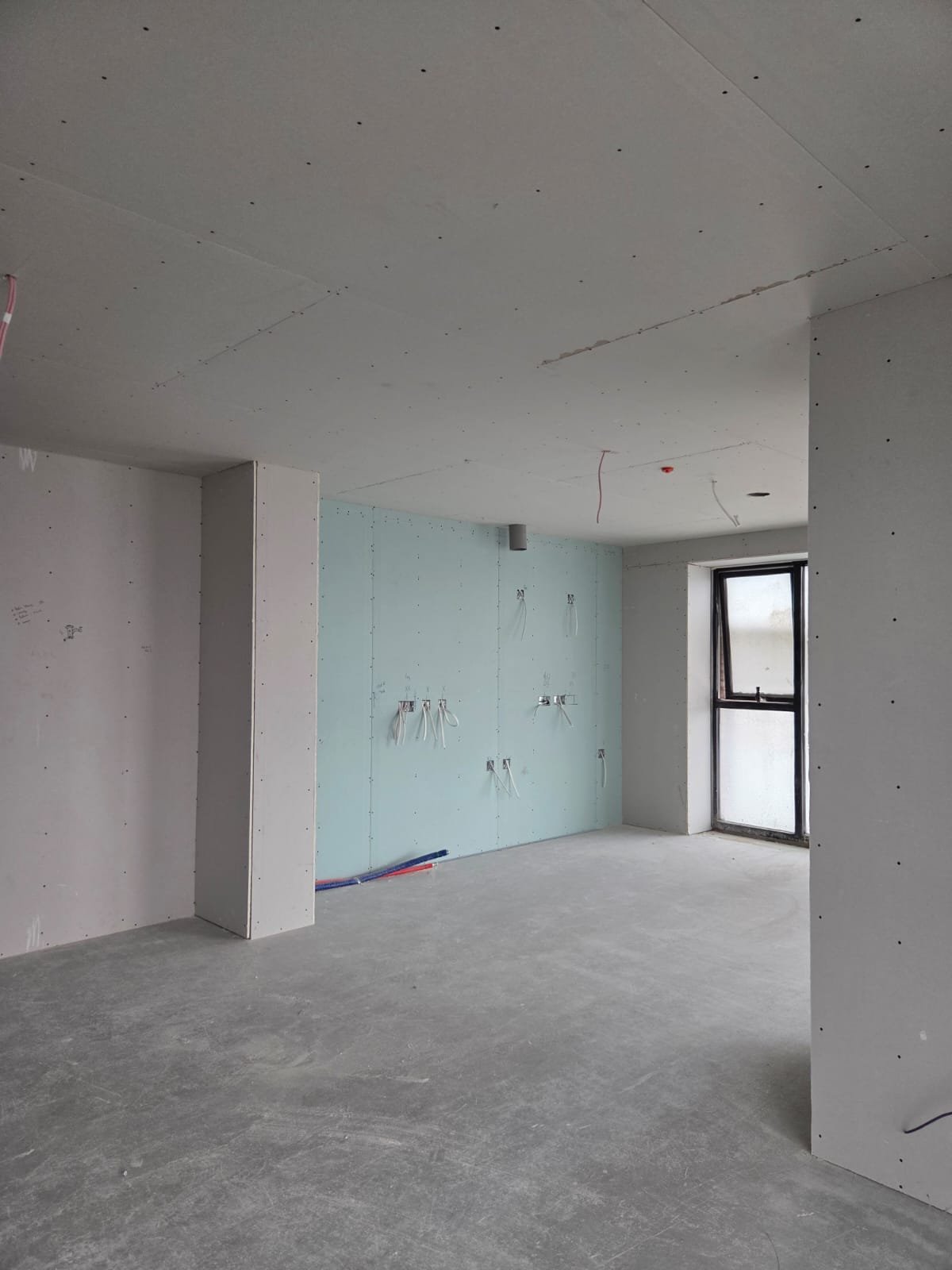 Completed plasterboard walls and ceilings in residential interior