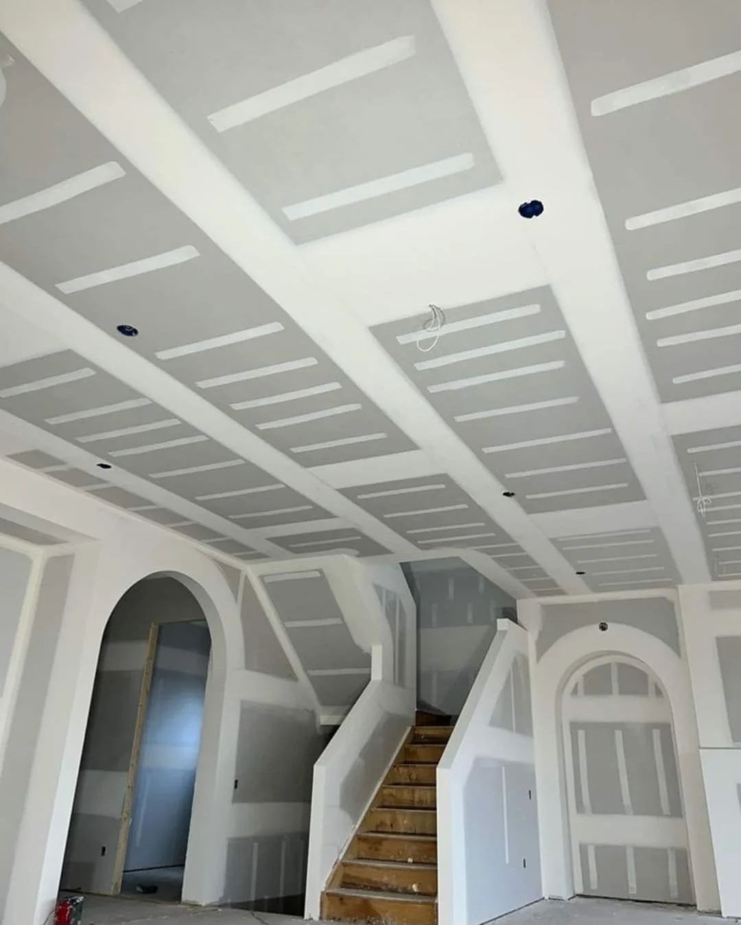 Finished plasterboard details around stair and ceiling areas