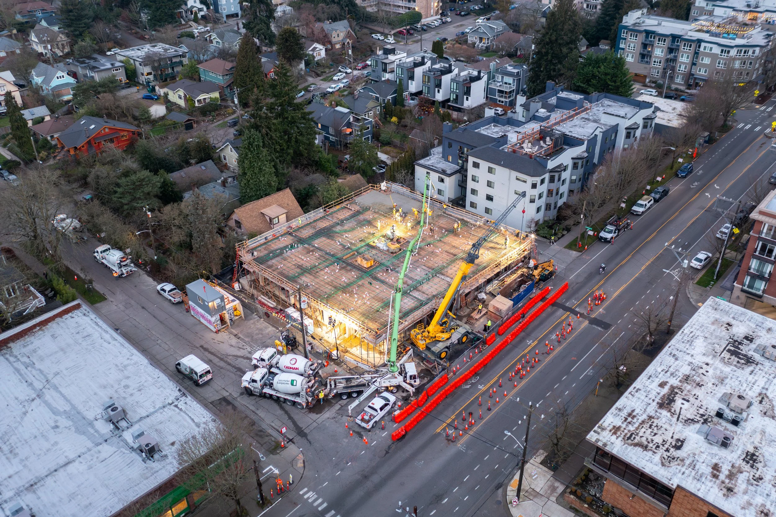 Aerial of a podium deck pour at dusk
