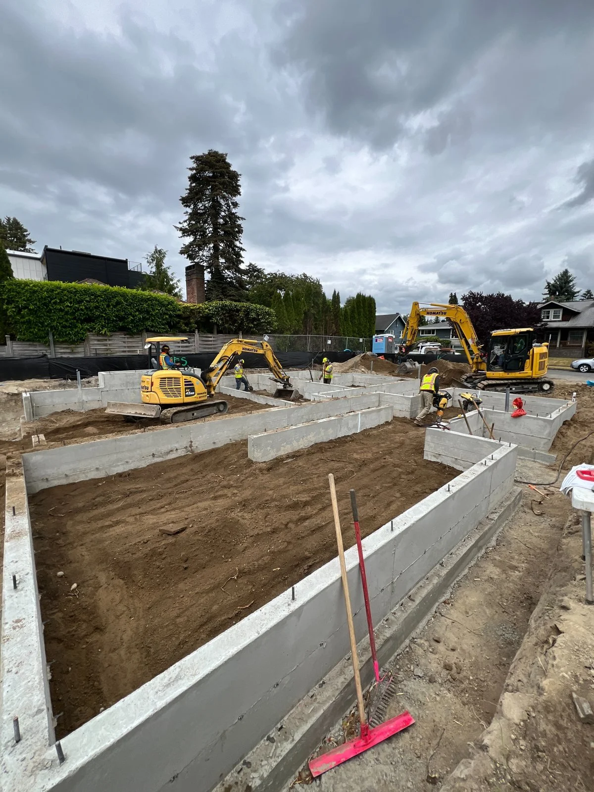 Three-home foundation layout in Seattle