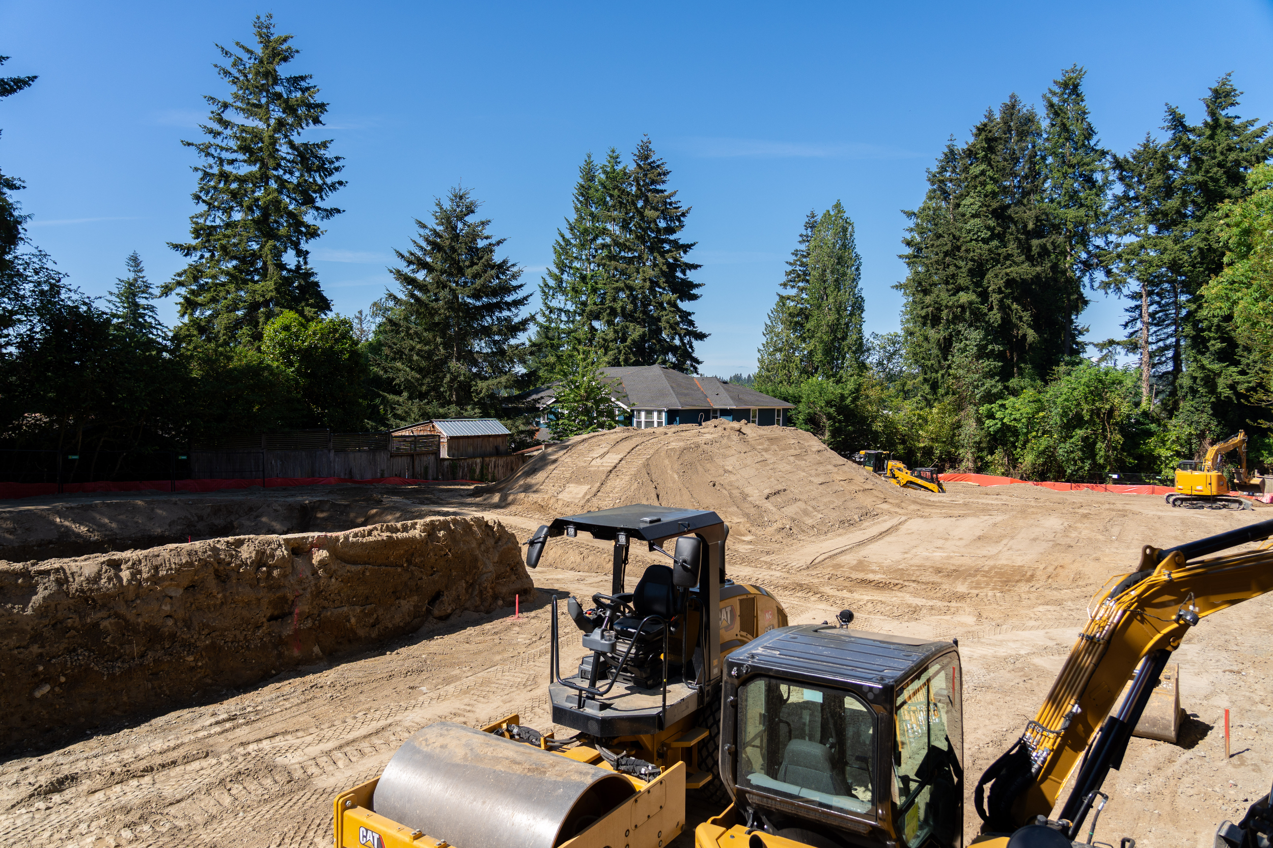 Skid steer and roller