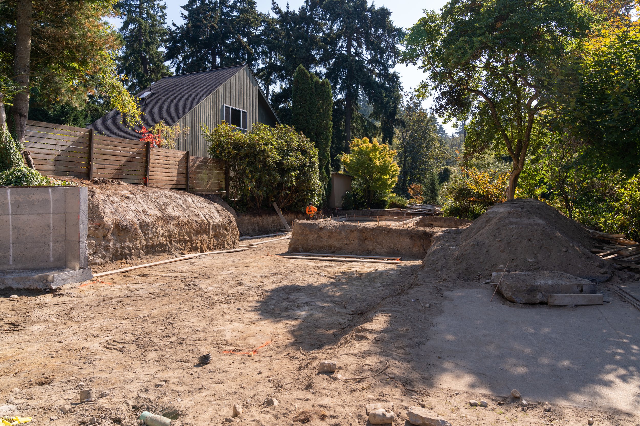 Graded pad with new foundation wall