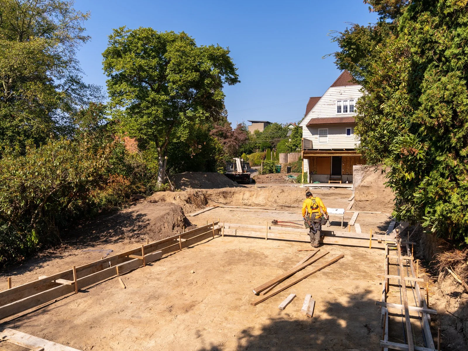 Hillside addition footing forms in a constrained residential site