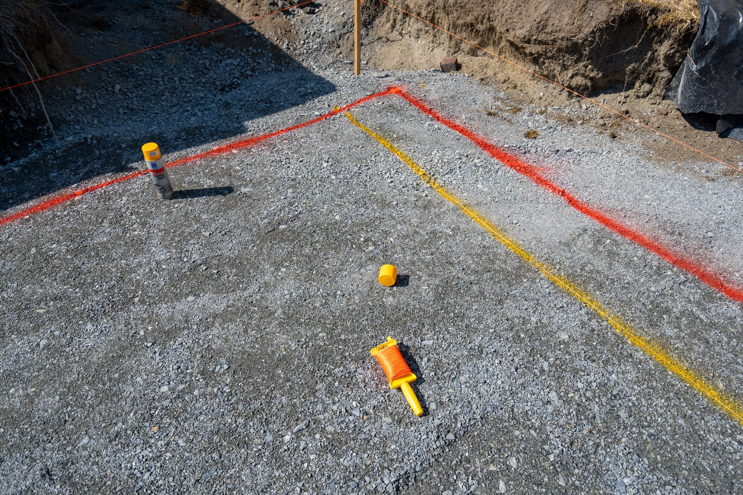 Rock section placed and staked to line
