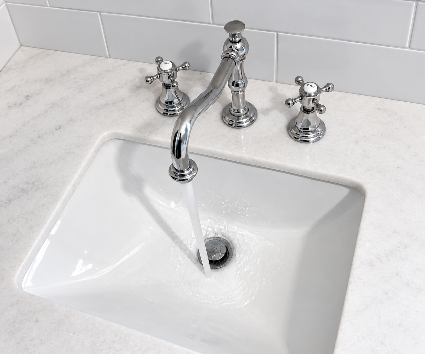 Chrome faucet and white sink