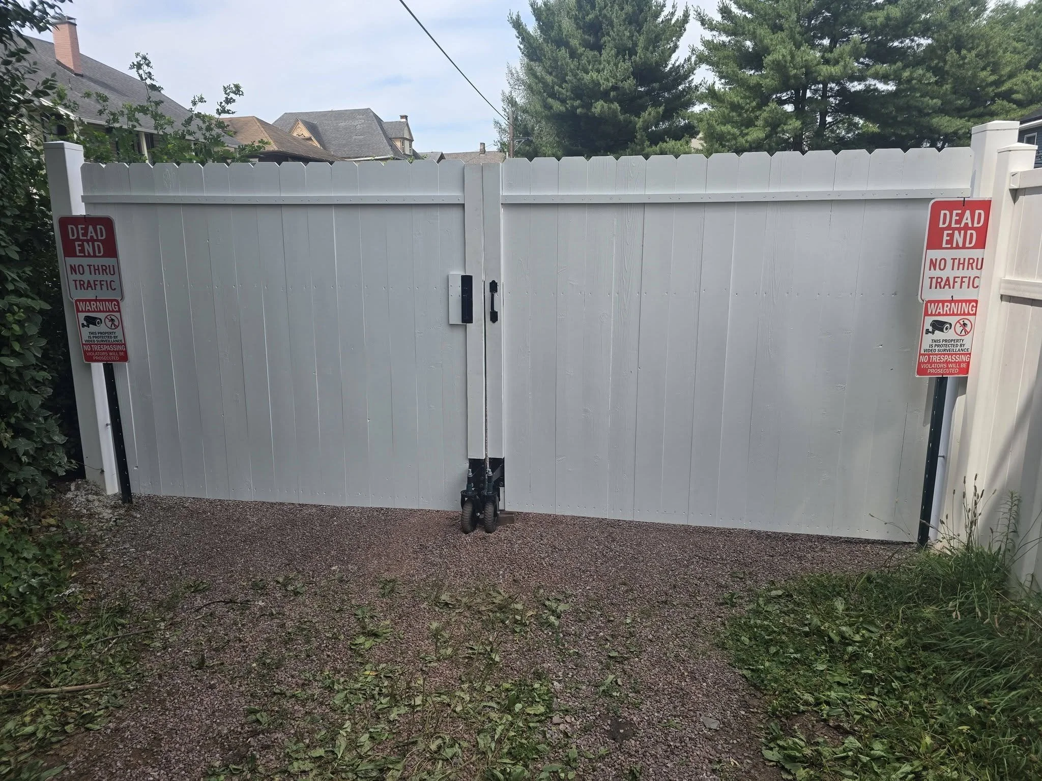 Outside of finished white double gate