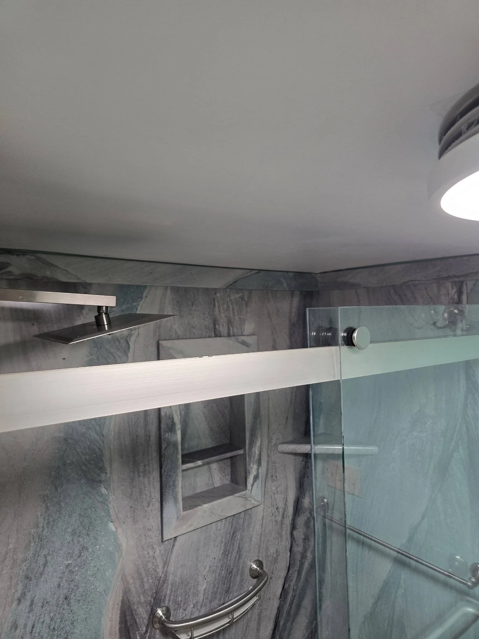 Rain shower head overhead