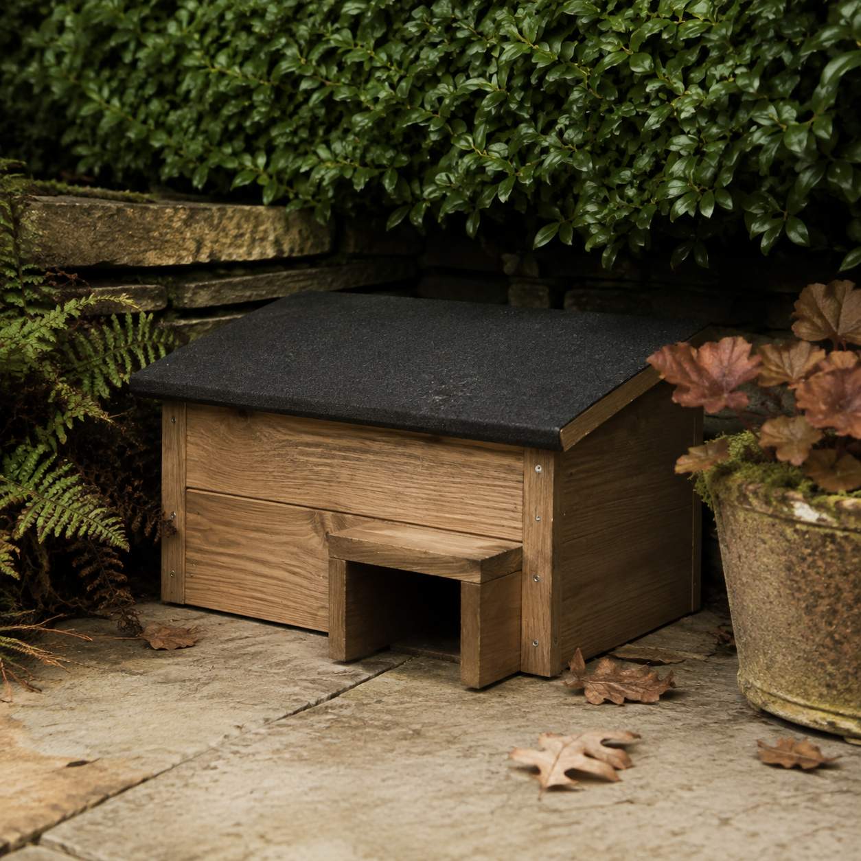 Kingston wooden hedgehog house with felt roof and tunnel entrance