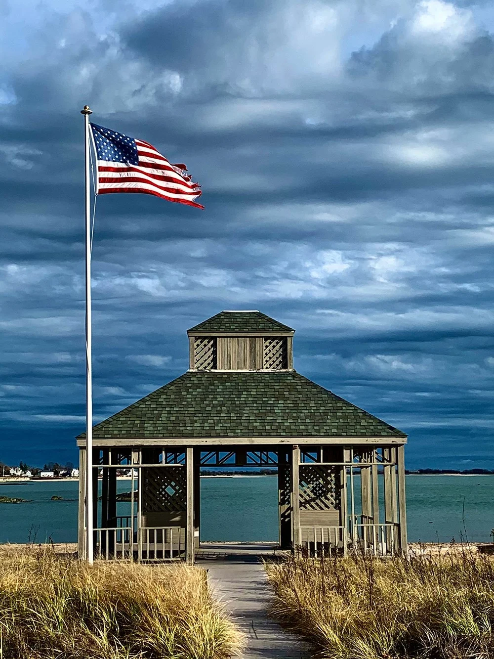 A shingled pavilion on the Madison shoreline