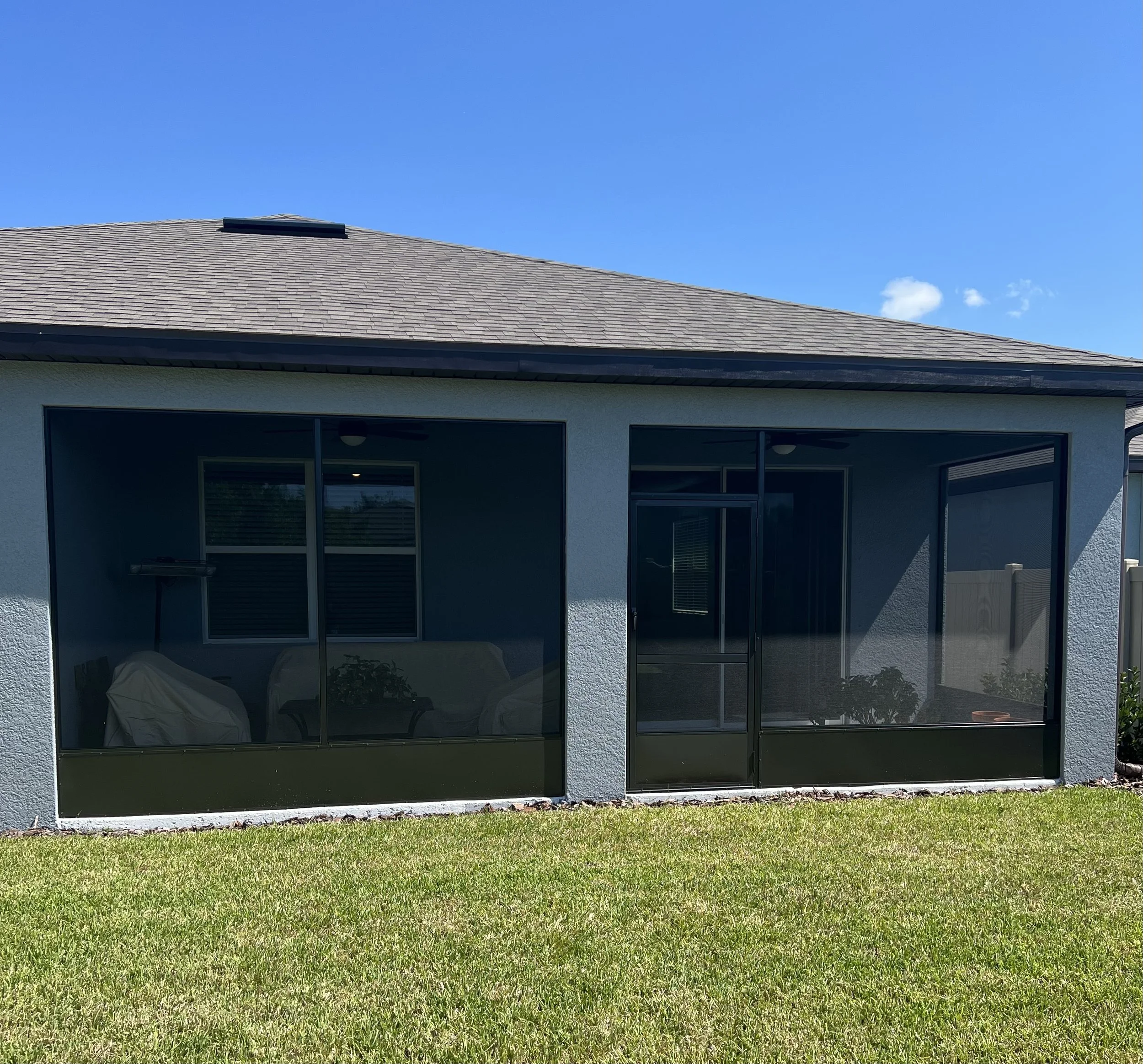 Lanai Guy rescreening a lanai in Plant City, FL.