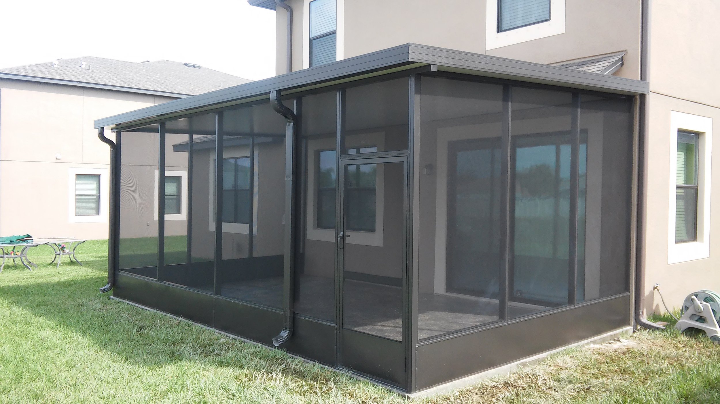 Screened lanai with outdoor seating in Brandon, FL.