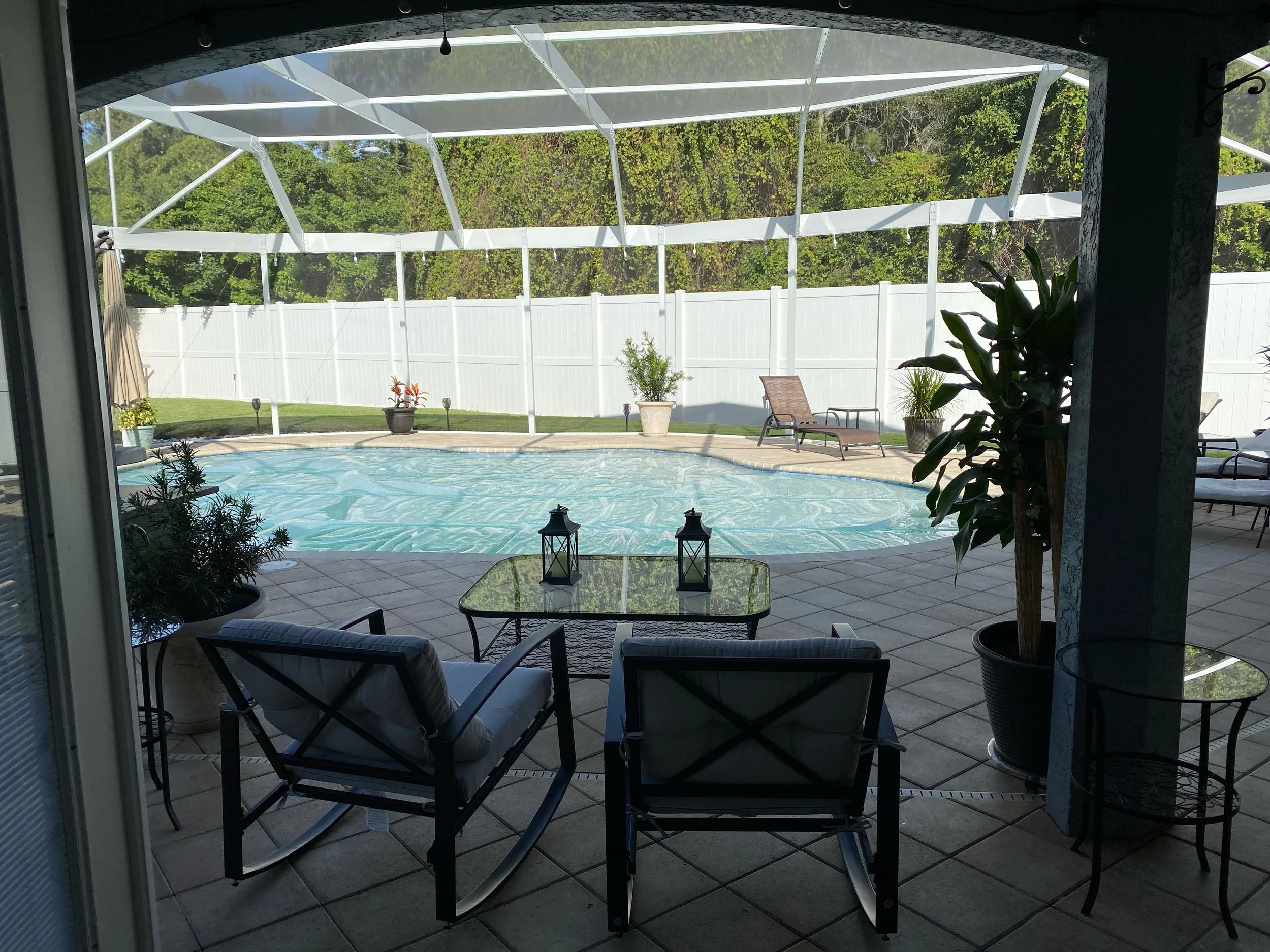 Screened lanai with outdoor seating in Brandon, FL.