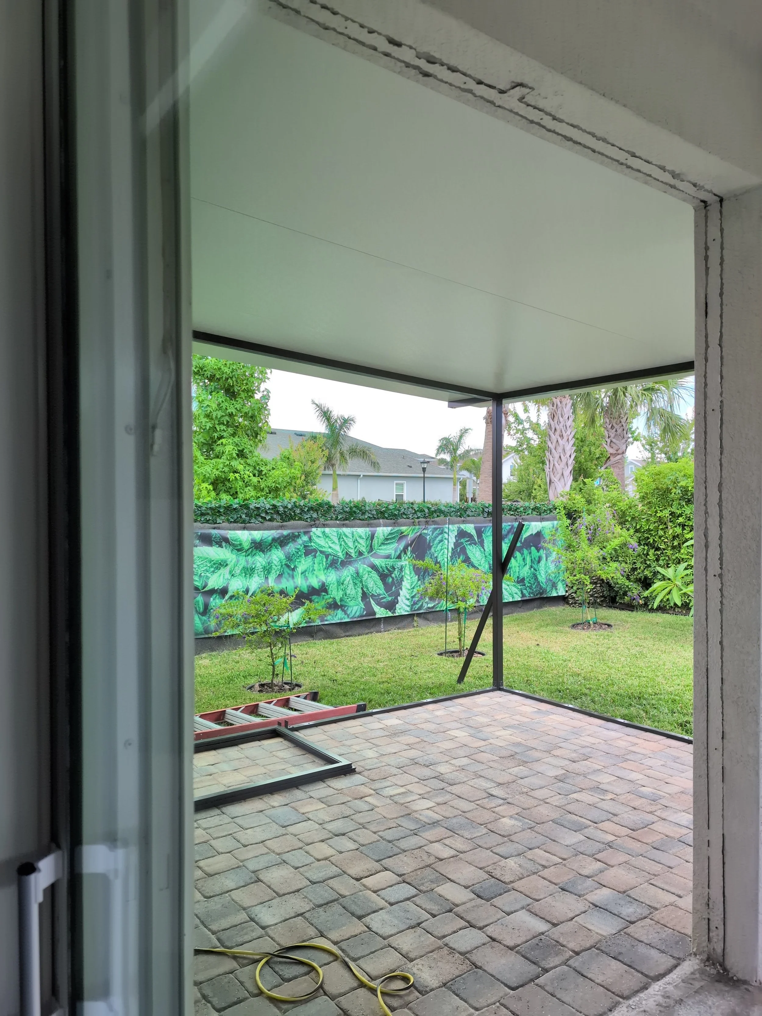 Screened lanai with outdoor seating in Brandon, FL.