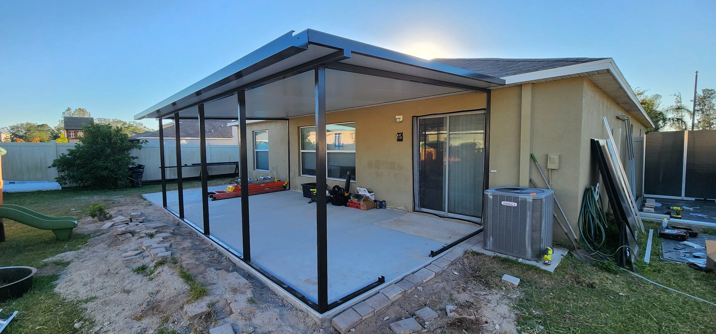 Screened lanai with outdoor seating in Brandon, FL.