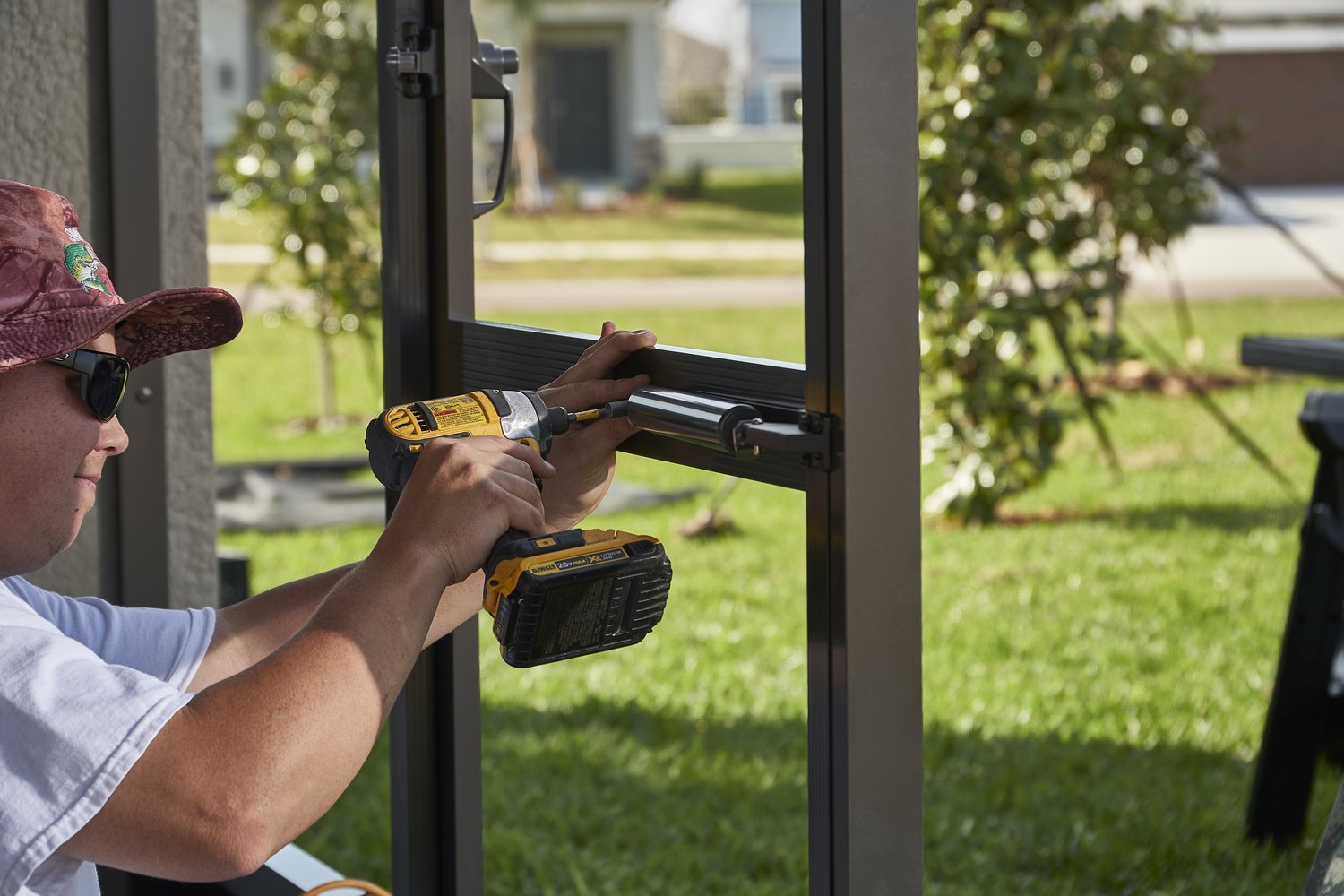 Lanai Guy crew repairing a screen enclosure.