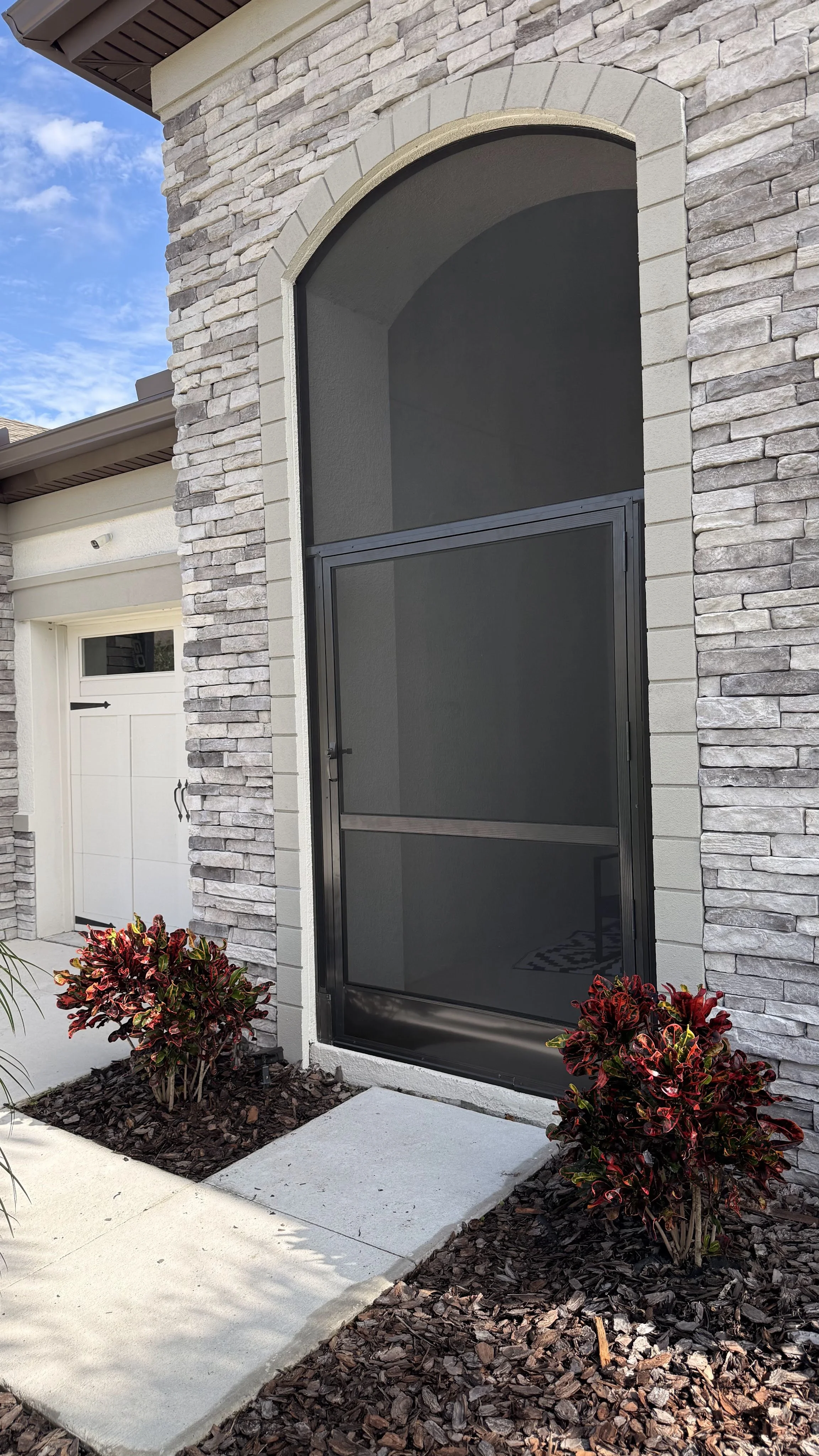 Screened lanai with outdoor seating in Brandon, FL.