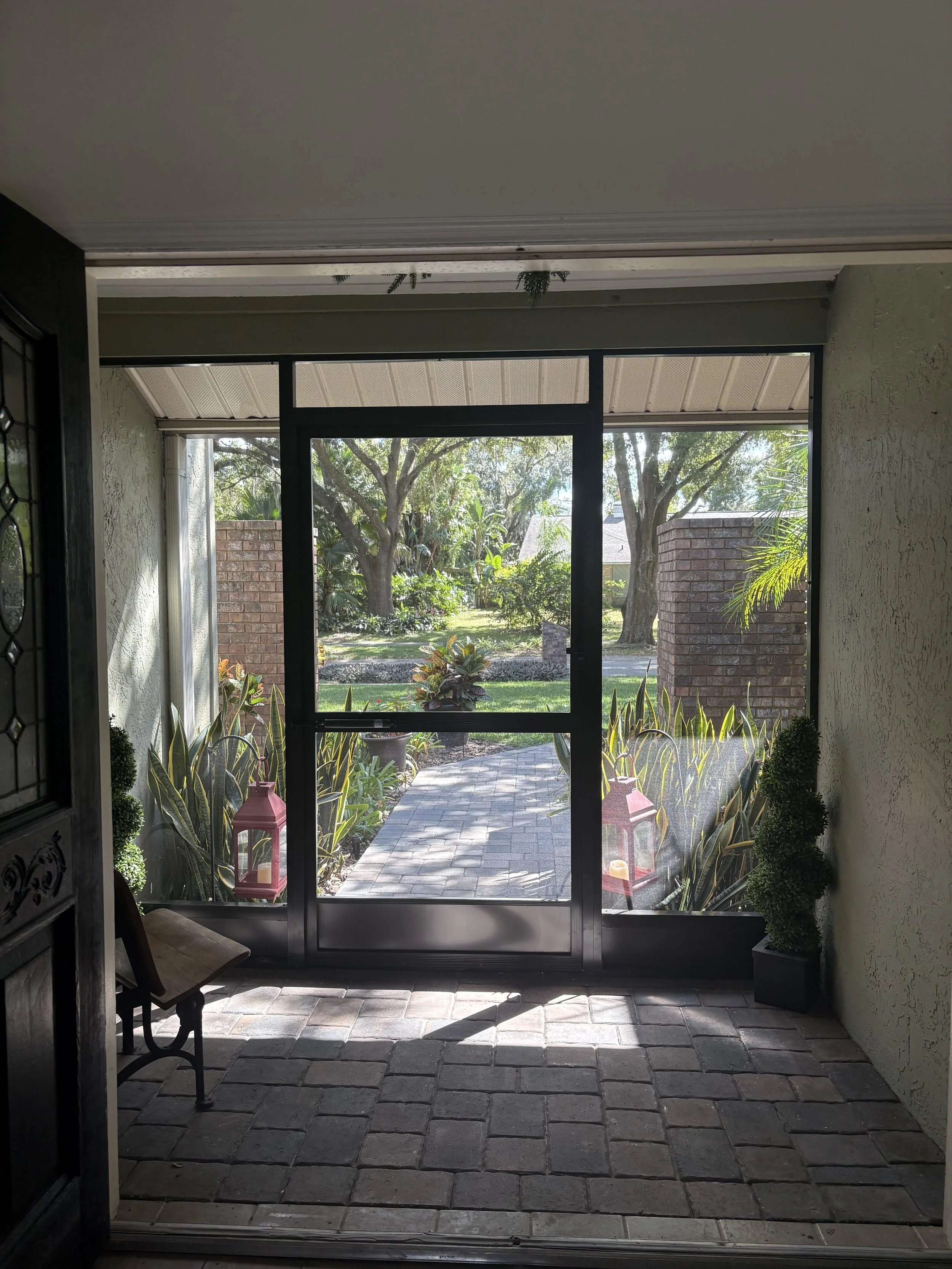 Lanai Guy rescreening a lanai in Plant City, FL.
